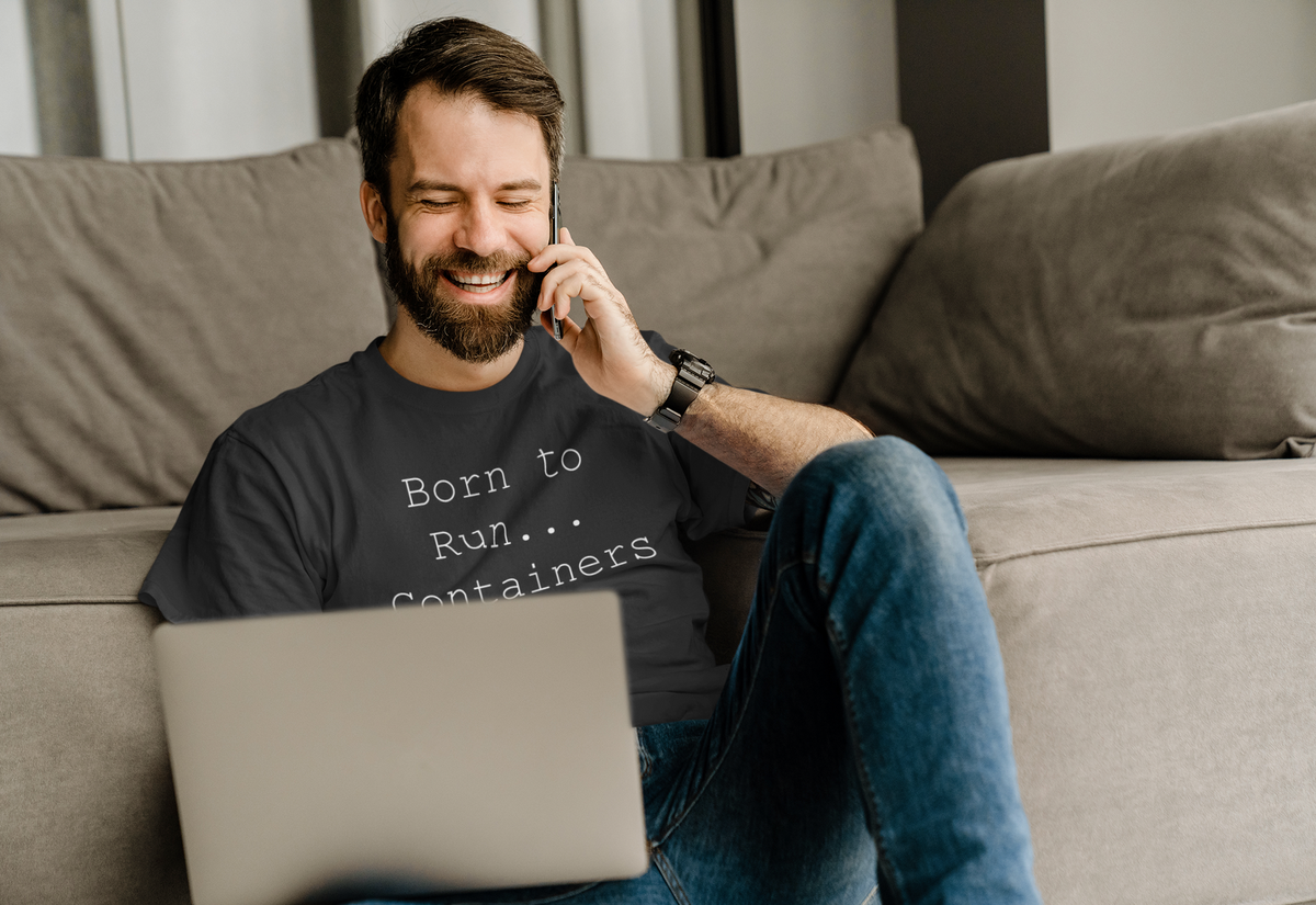 'Born to Run... Containers' t-shirt in black, man wearing it on couch, funny gift for container engineers