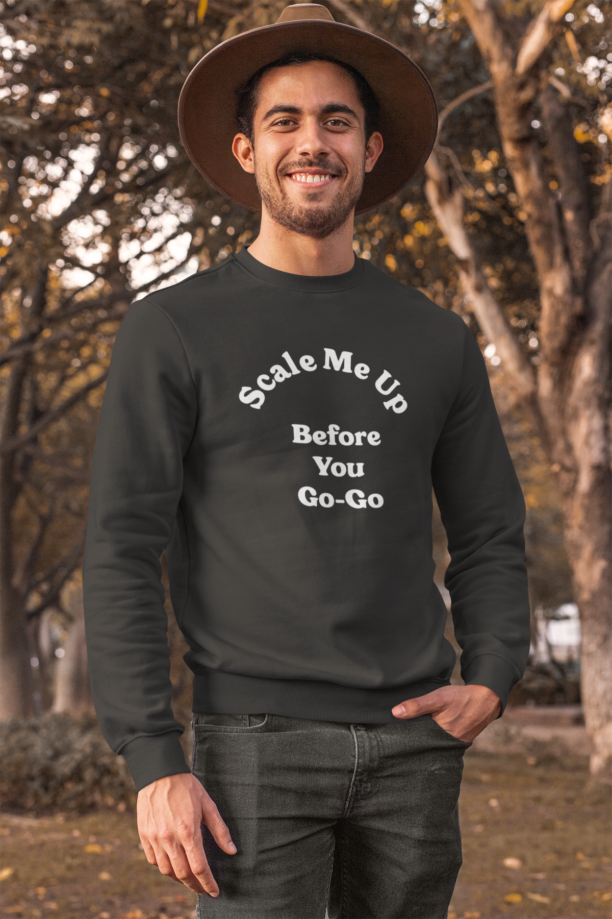 'Scale Me Up Before You Go-Go' sweatshirt in charcoal, man wearing it outdoors in a hat, funny tech gift