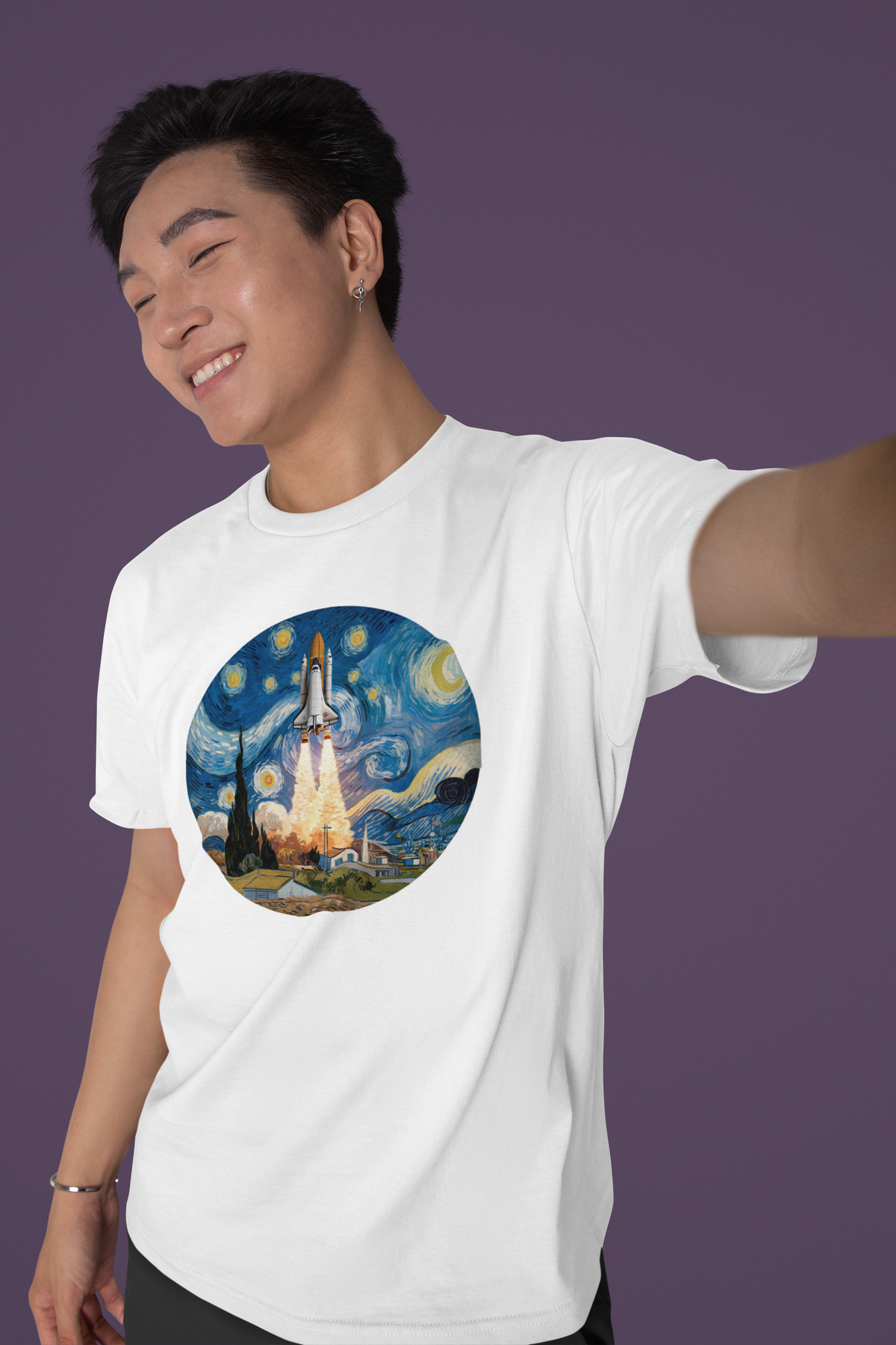 Van Gogh Spaceship T-Shirt in white, man wearing it against purple backdrop smiling, space art gift