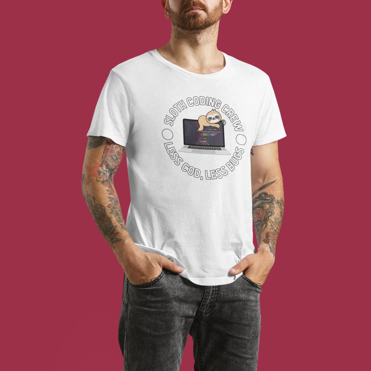 'Sloth Coding Crew' badge T-shirt in white, man wearing it against a maroon backdrop, coder gift tee
