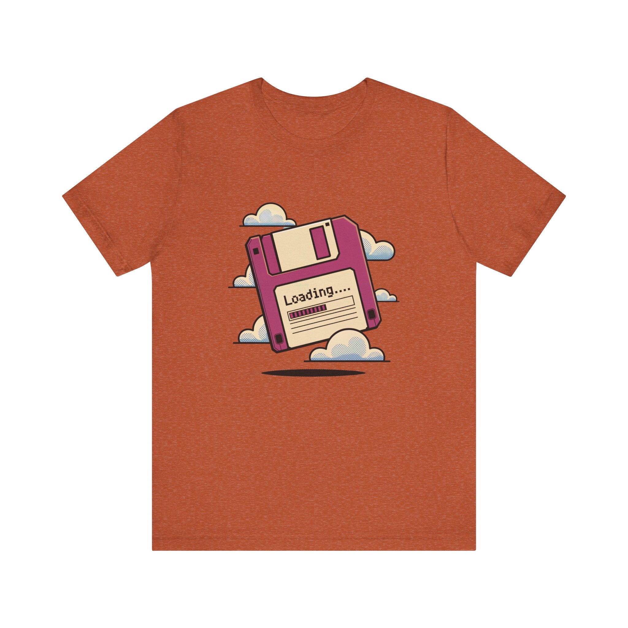 The Floppy disk -T Shirt is a soft cotton tee with tapered shoulders, featuring a pink floppy disk graphic above clouds and a "Loading..." label.
