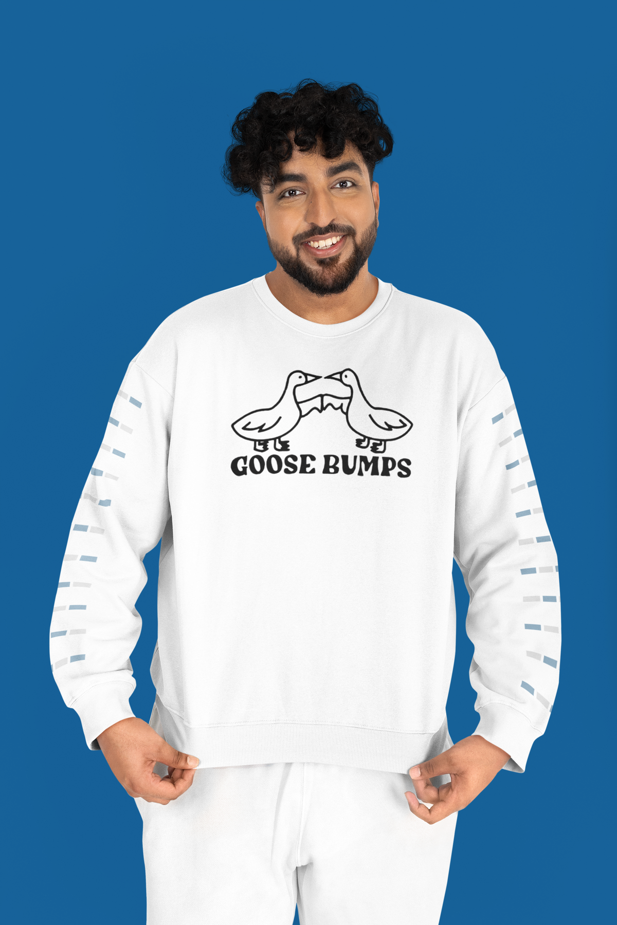 "Goose Bumps" sweatshirt in white, man wearing it on a blue backdrop, funny pun gift sweatshirt
