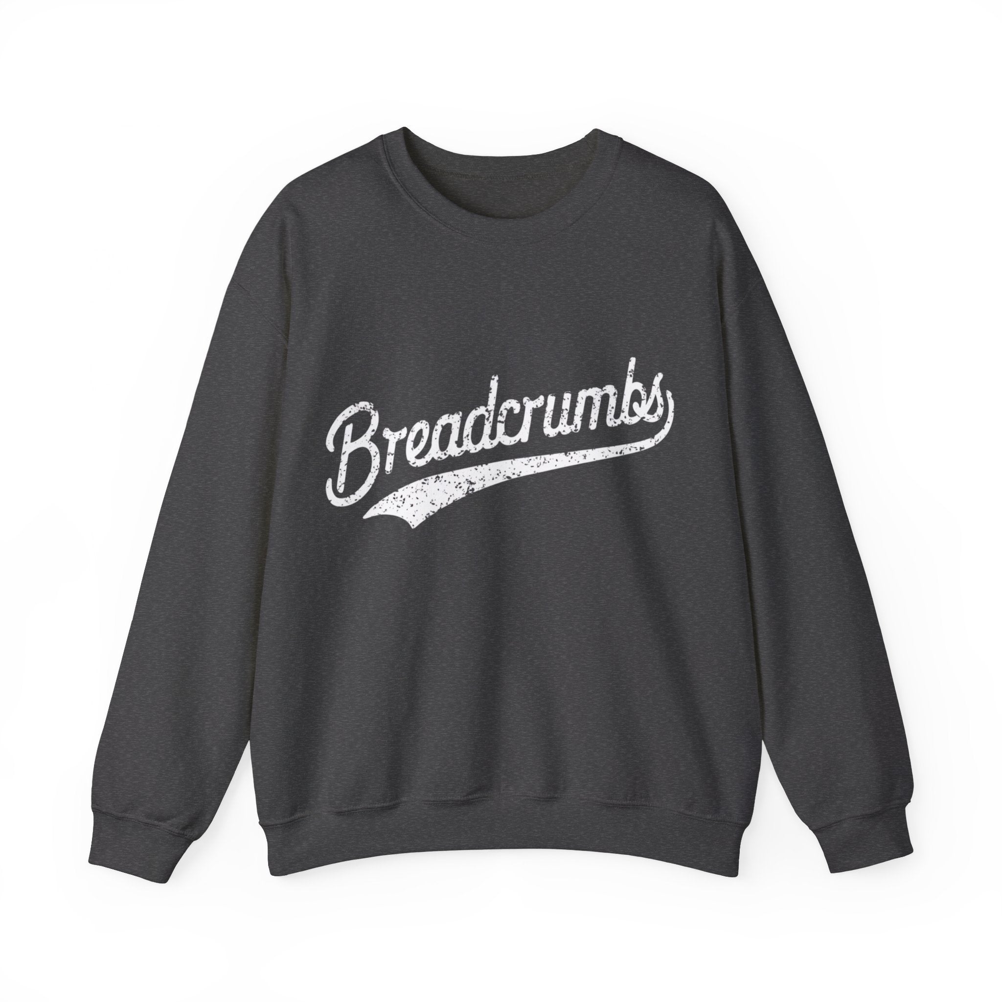 A cozy black Breadcrumbs - Sweatshirt perfect for the colder months, featuring the word "Breadcrumbs" written in white cursive text across the front.