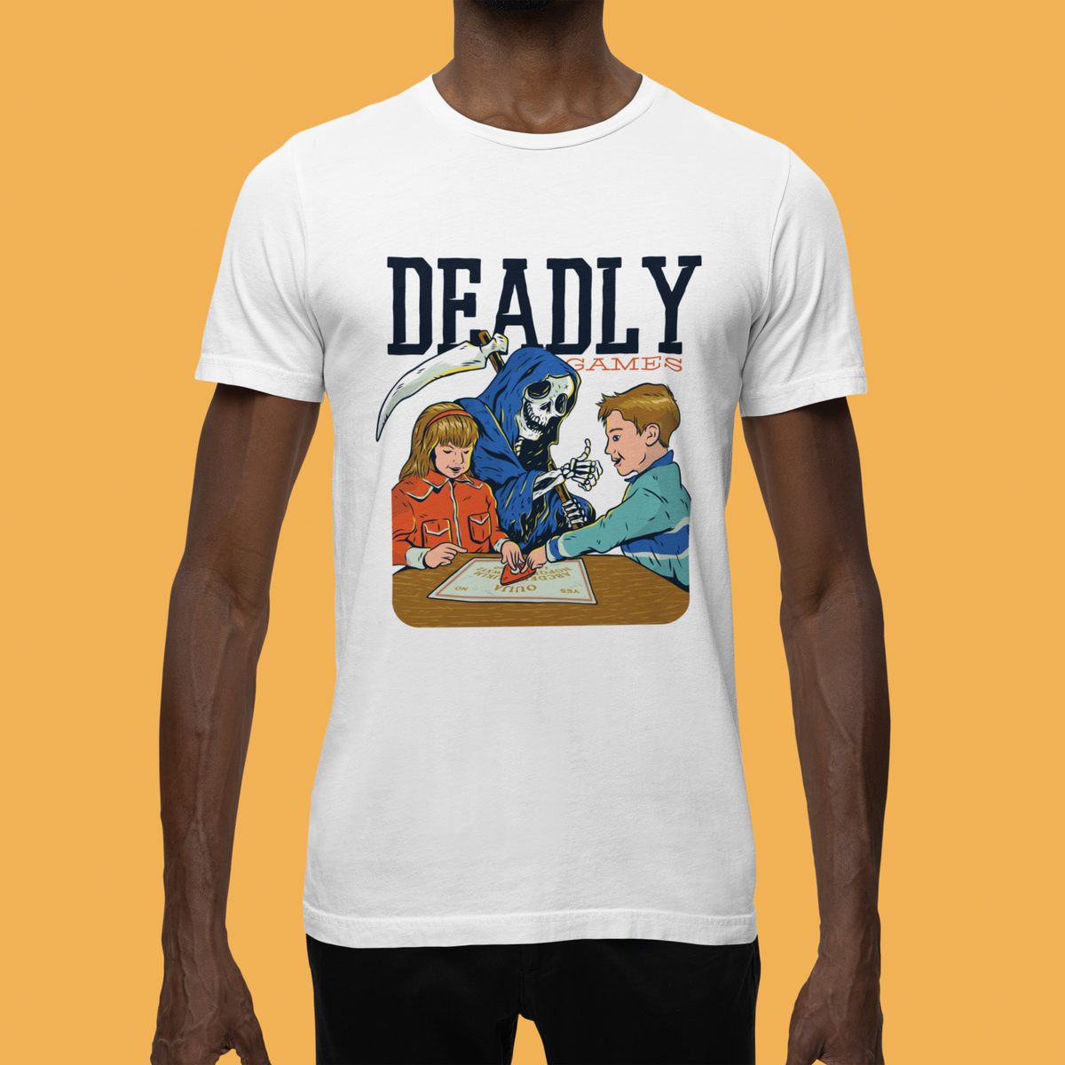 'Deadly Games' t-shirt in white, man model wearing it against an orange background, spooky board game gift shirt