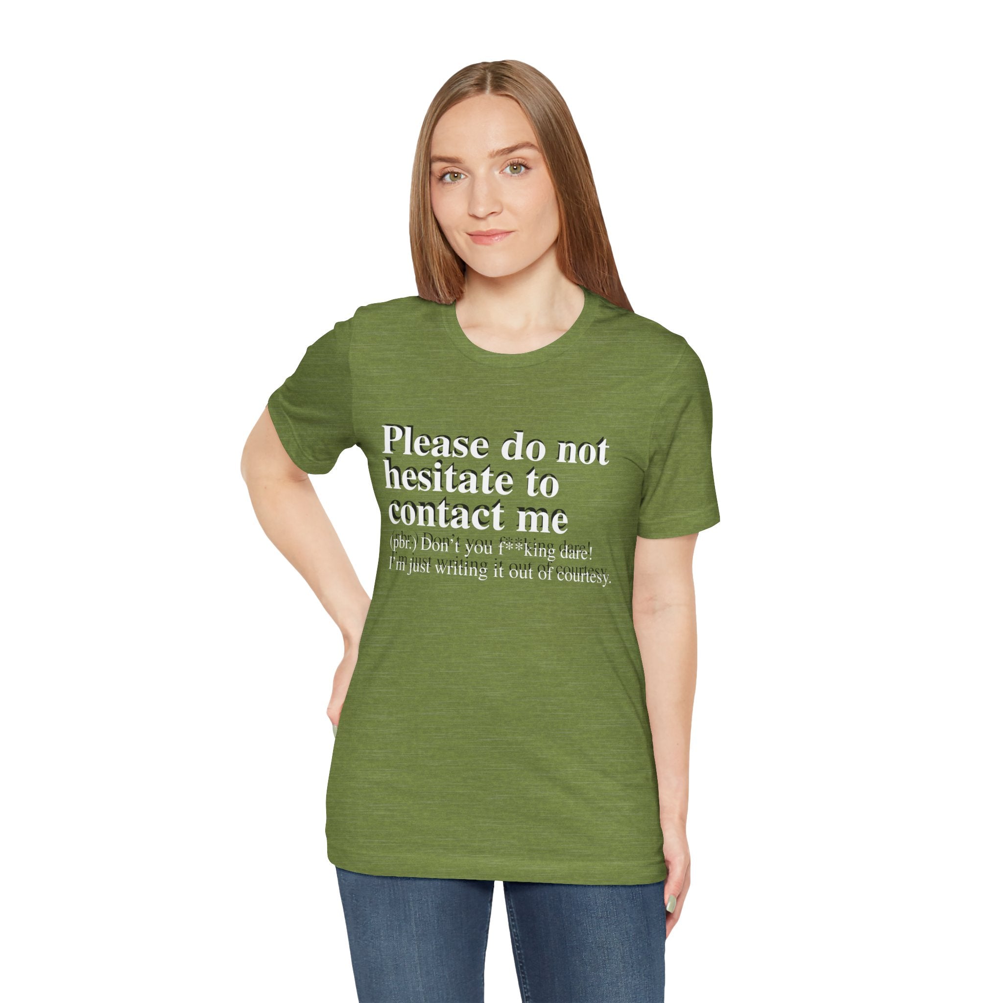 Woman in green Please Do Not Hesitate to Contact Me T-Shirt with text "please do not hesitate to contact me (this isn't you 'making me'! I'm just writing it out of courtesy)" standing against a white