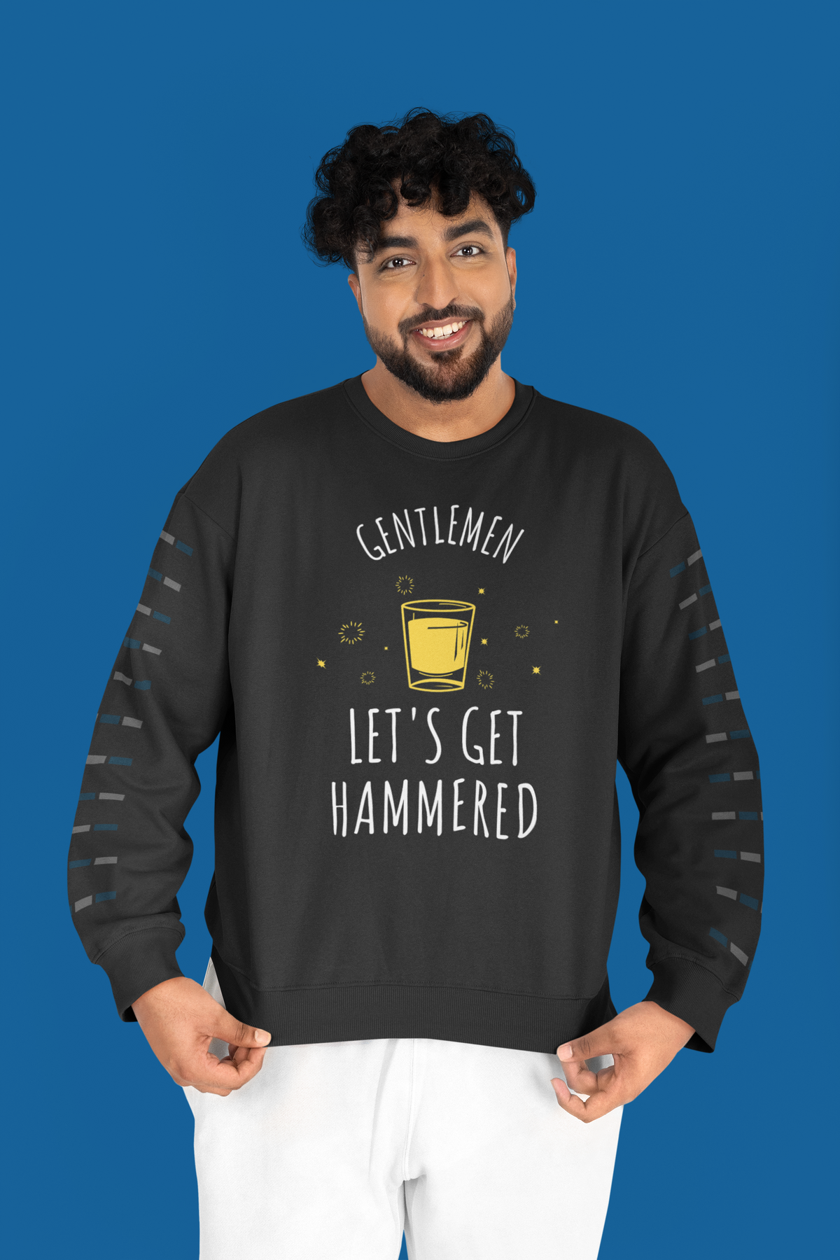 'Gentlemen Let's Get Hammered' sweatshirt in black, man standing against a blue backdrop, bachelor party gift