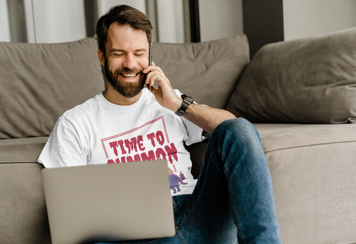 'Time to Summon' cat T-shirt in white, man wearing it while relaxing on a couch, funny cat lover shirt
