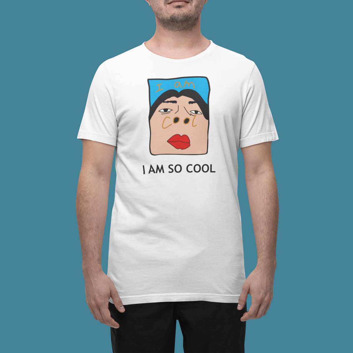 'I Am Cool' t-shirt in white, man wearing it in a studio, T-Shirt mockup, Geekpsters