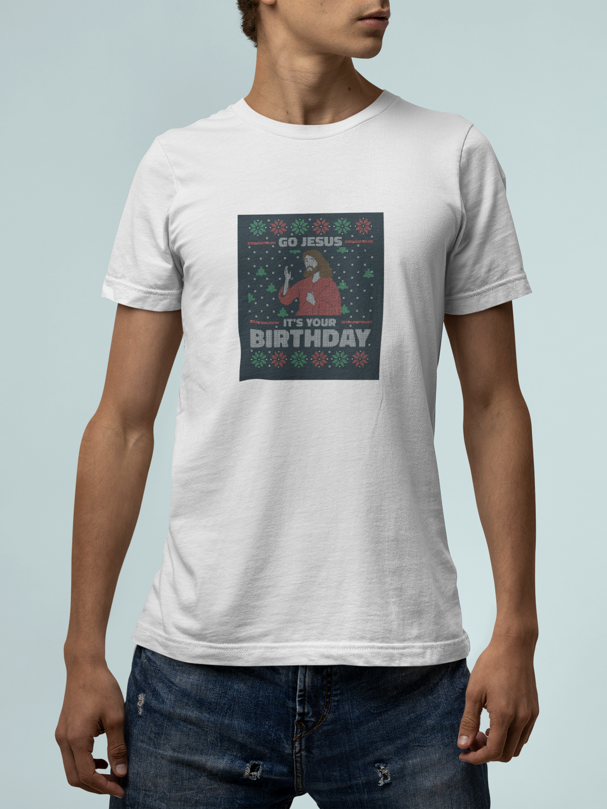 'Go Jesus It's Your Birthday Ugly Sweater T-Shirt' in white, man against a light backdrop, T-Shirt mockup, Geekpsters