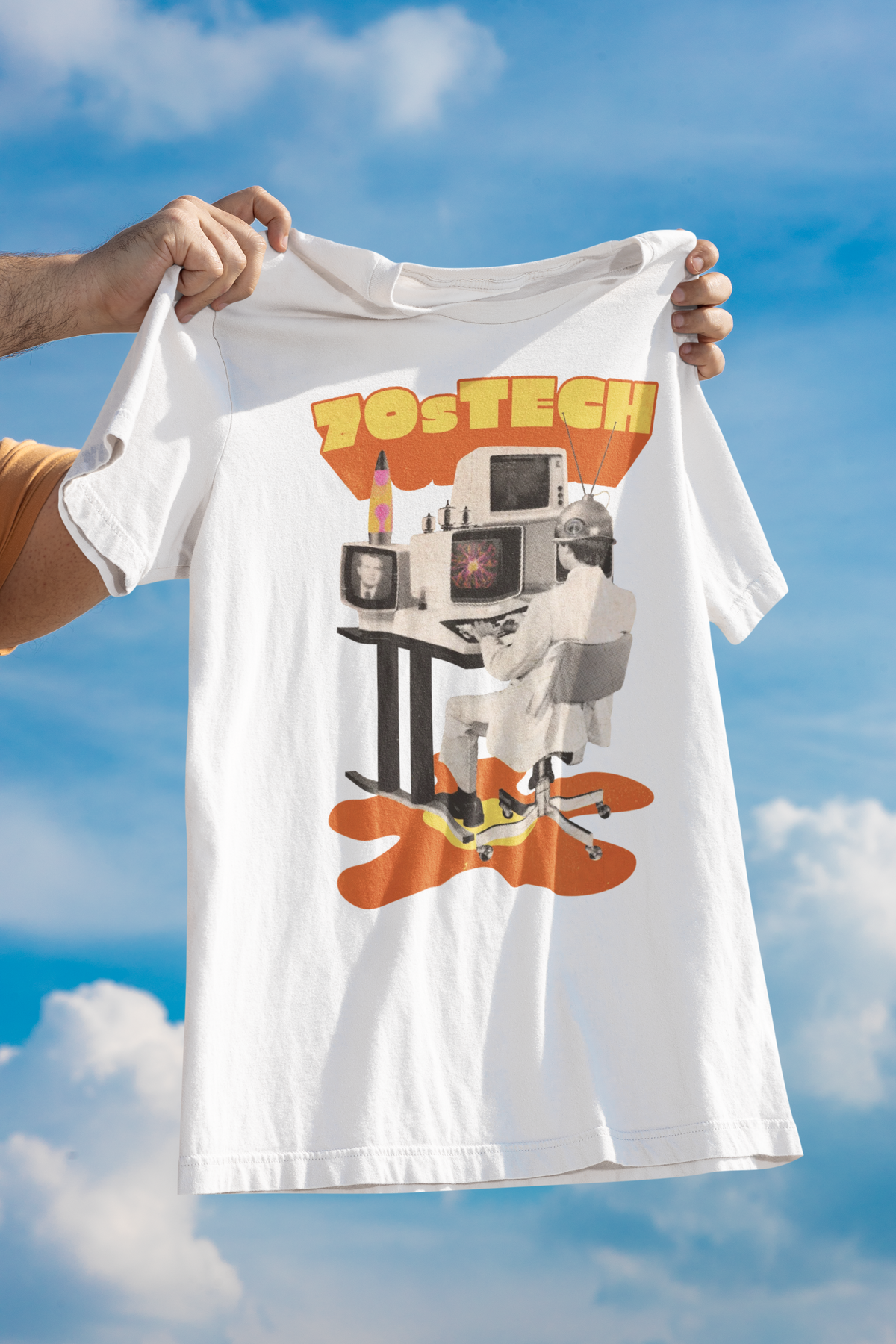 '70s Tech' t-shirt in white, held up outdoors against a cloudy sky backdrop, funny vintage tech gift