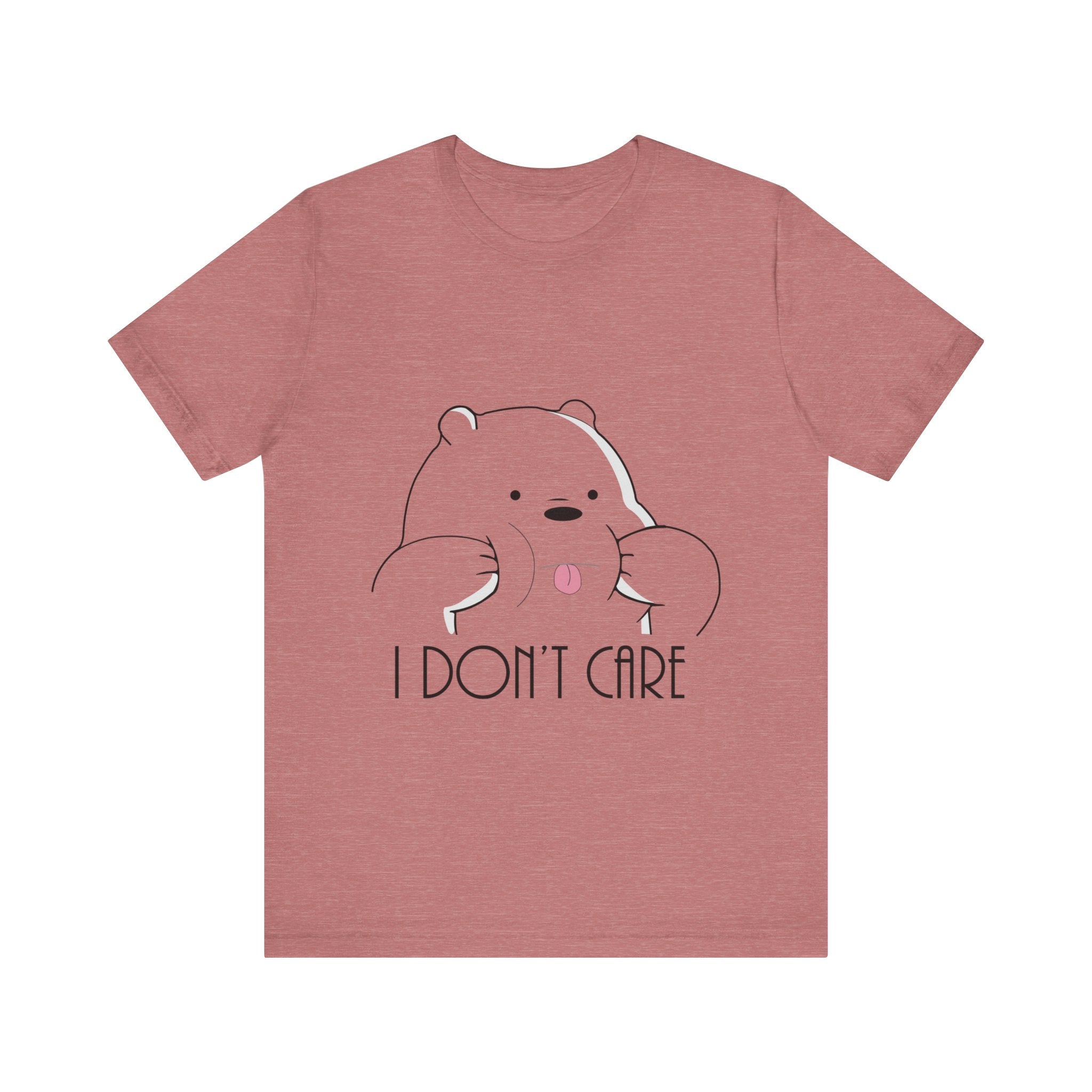 A soft cotton heather pink I Don't Care Panda T-Shirt featuring a cartoon bear with the phrase "i don't care" printed on the front.