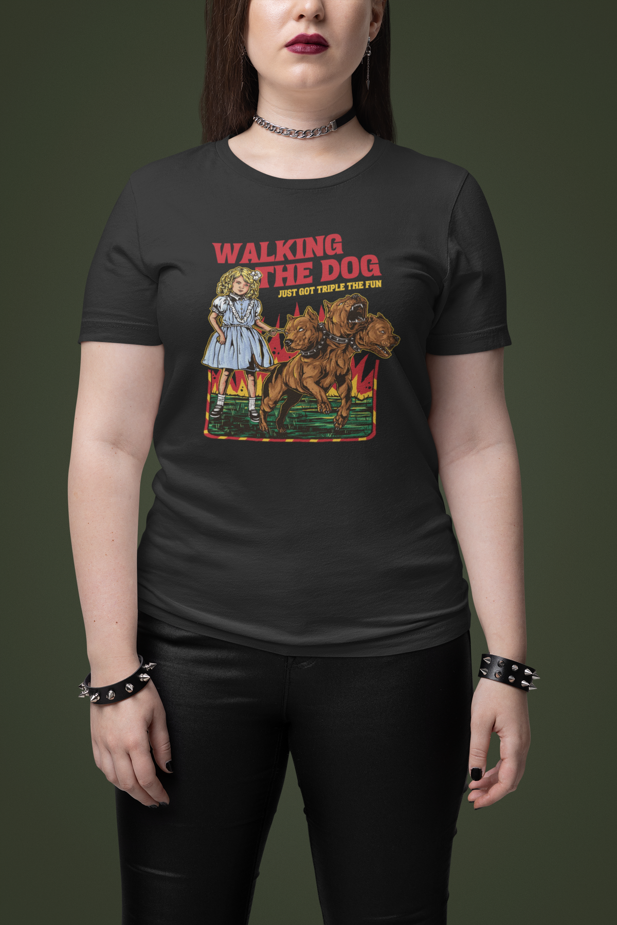 'Walking the Dog From Hell' t-shirt in black, woman model wearing it against a dark green background, funny dog gift shirt
