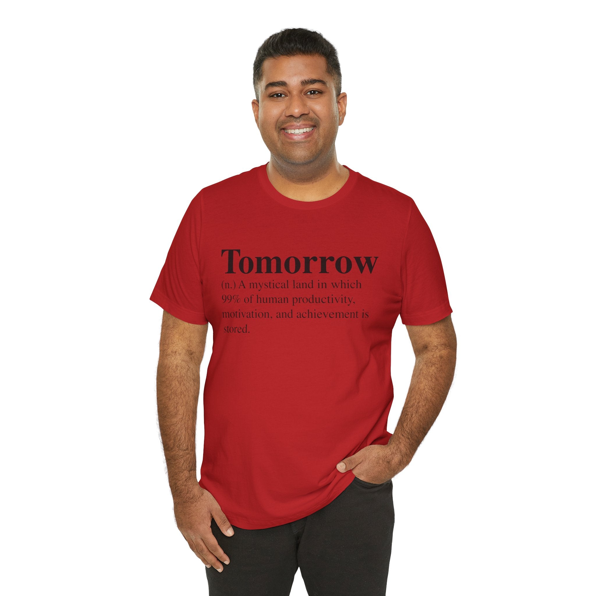 Man smiling in a red, soft cotton Tomorrow T-Shirt with a humorous definition of "tomorrow" quality print on it.