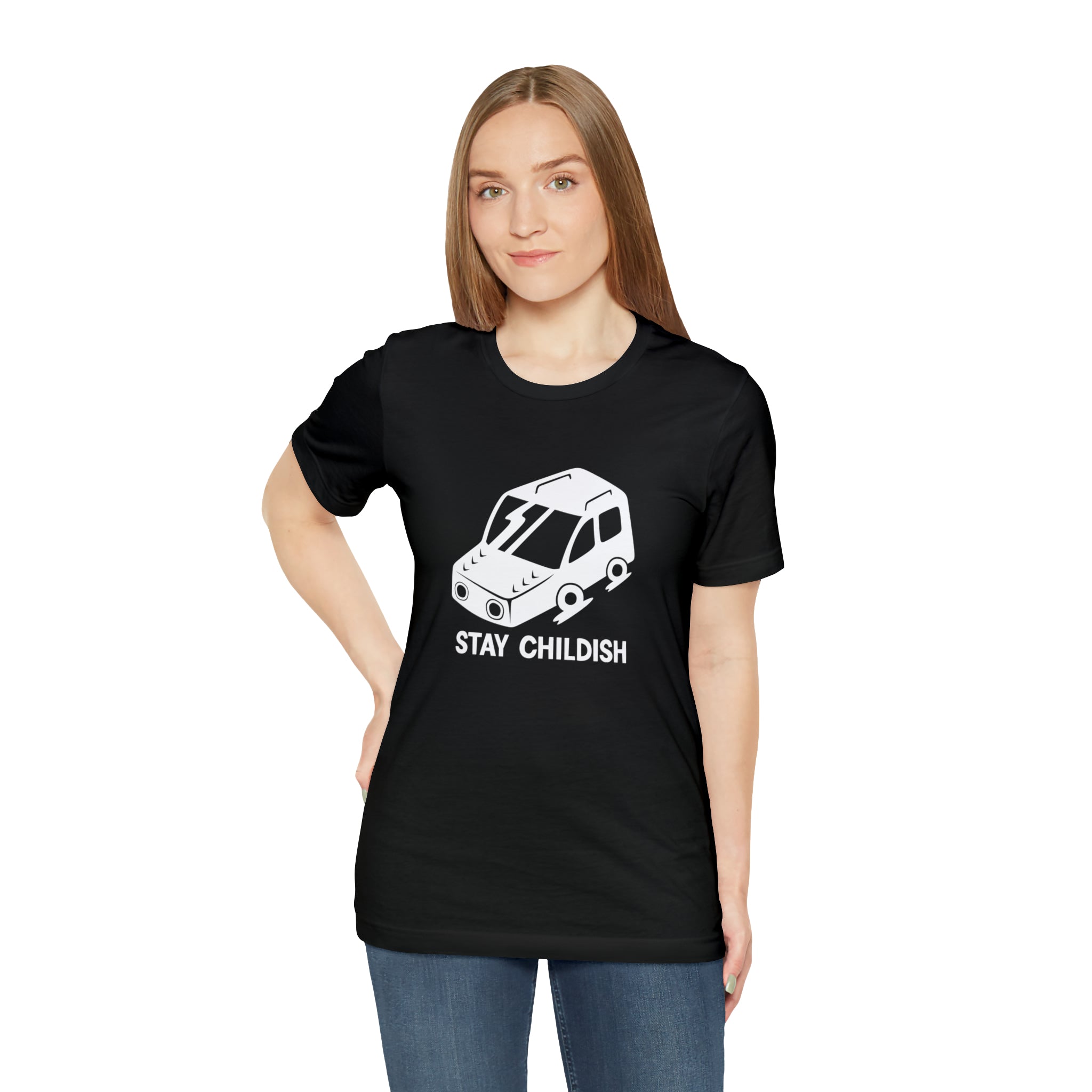 A woman wearing a black Stay Childish T-shirt depicting a white car, staying young at heart.
