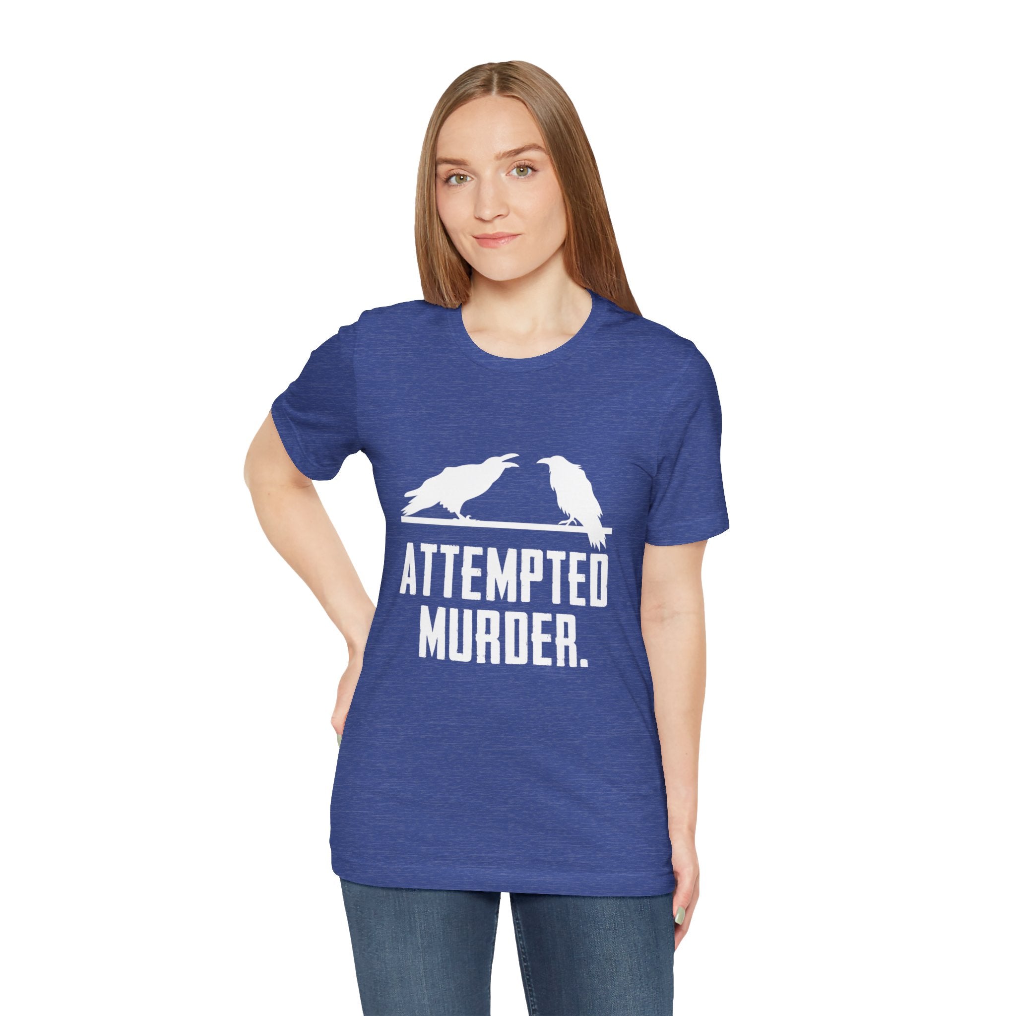 A person wears the stylish "Attempted Murder" T-Shirt, which features two illustrated crows and a clever touch of humor.