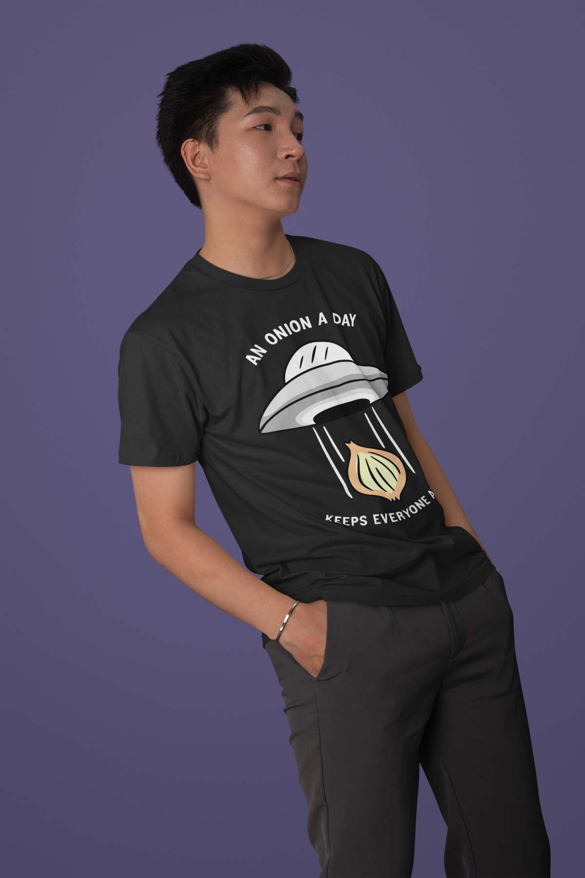'An Onion a Day Keeps Everyone Away' UFO t-shirt in black, man wearing it, funny gift for introverts
