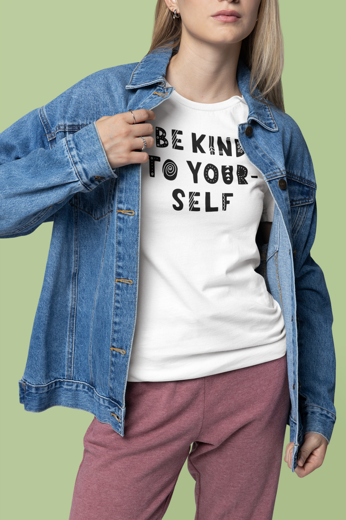 'Be Kind To Yourself' t-shirt in white, woman in denim jacket wearing it