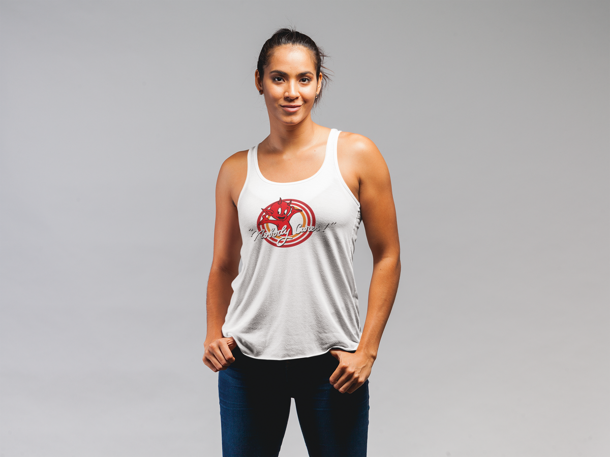 "Nobody Cares, Work Harder" devil graphic tank top in white, woman wearing it in studio, funny hustle gift for her