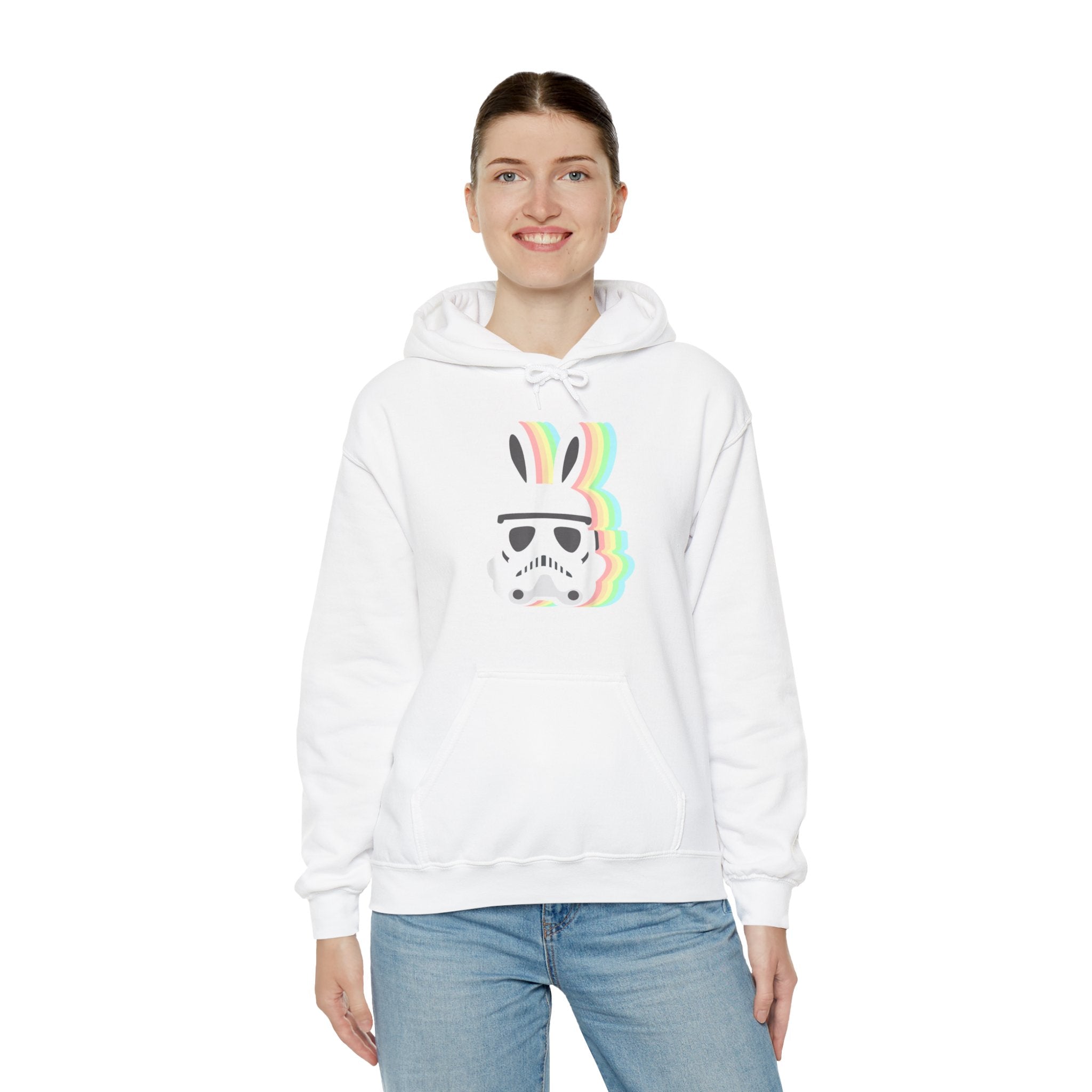 A person with a smile wearing a Star Wars Easter Stormtrooper - Hooded Sweatshirt and blue jeans, shown against a plain white background.