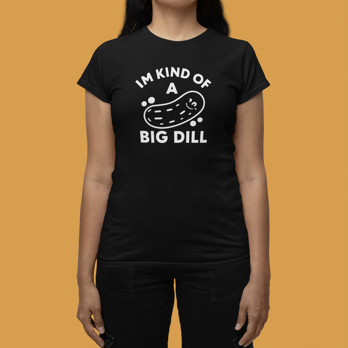 'I'm Kind of a Big Dill' t-shirt in black, close up of woman wearing it, funny pickle pun gift