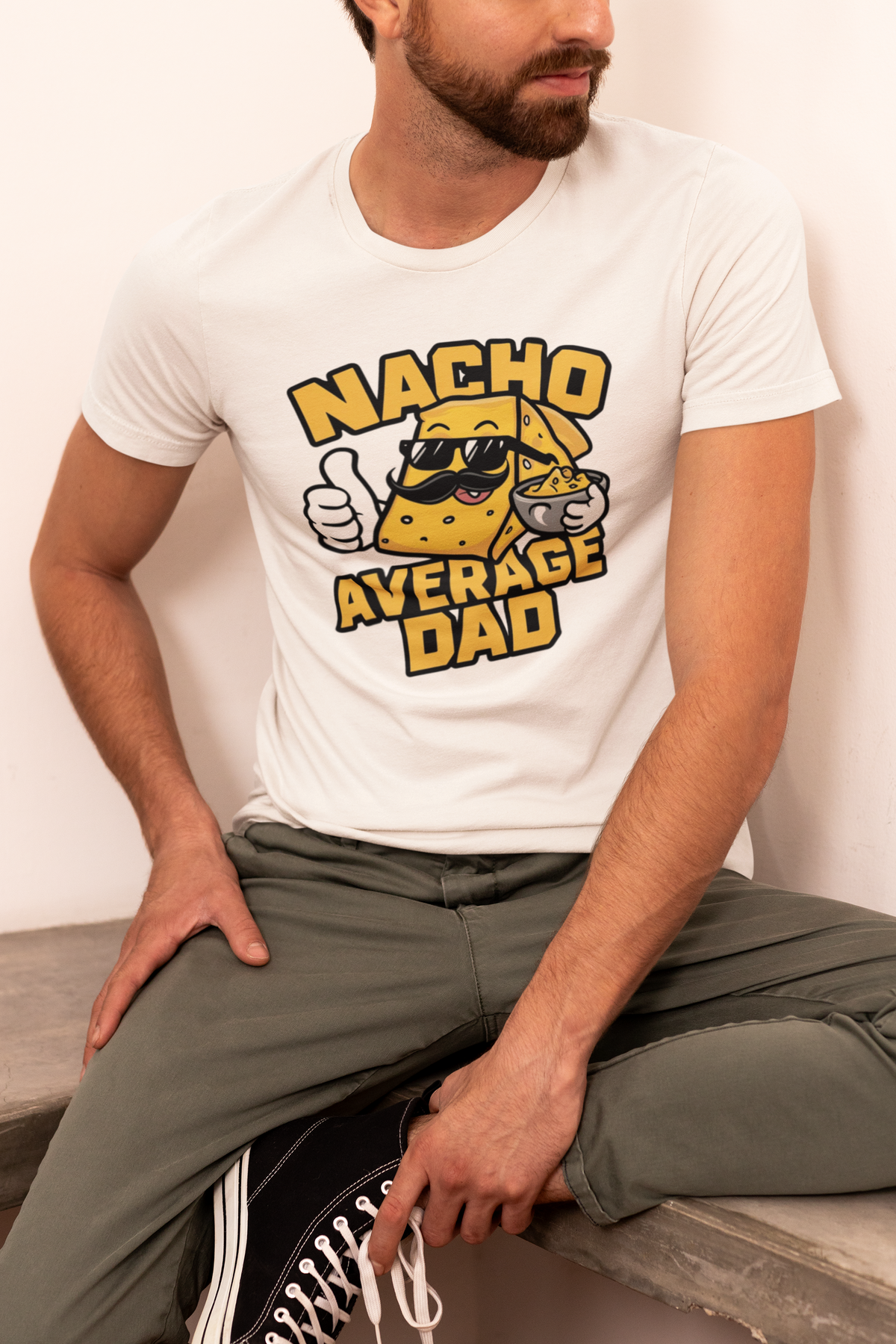 "Nacho Average Dad" t-shirt in white, man modeling it standing, funny gift for nacho loving dads