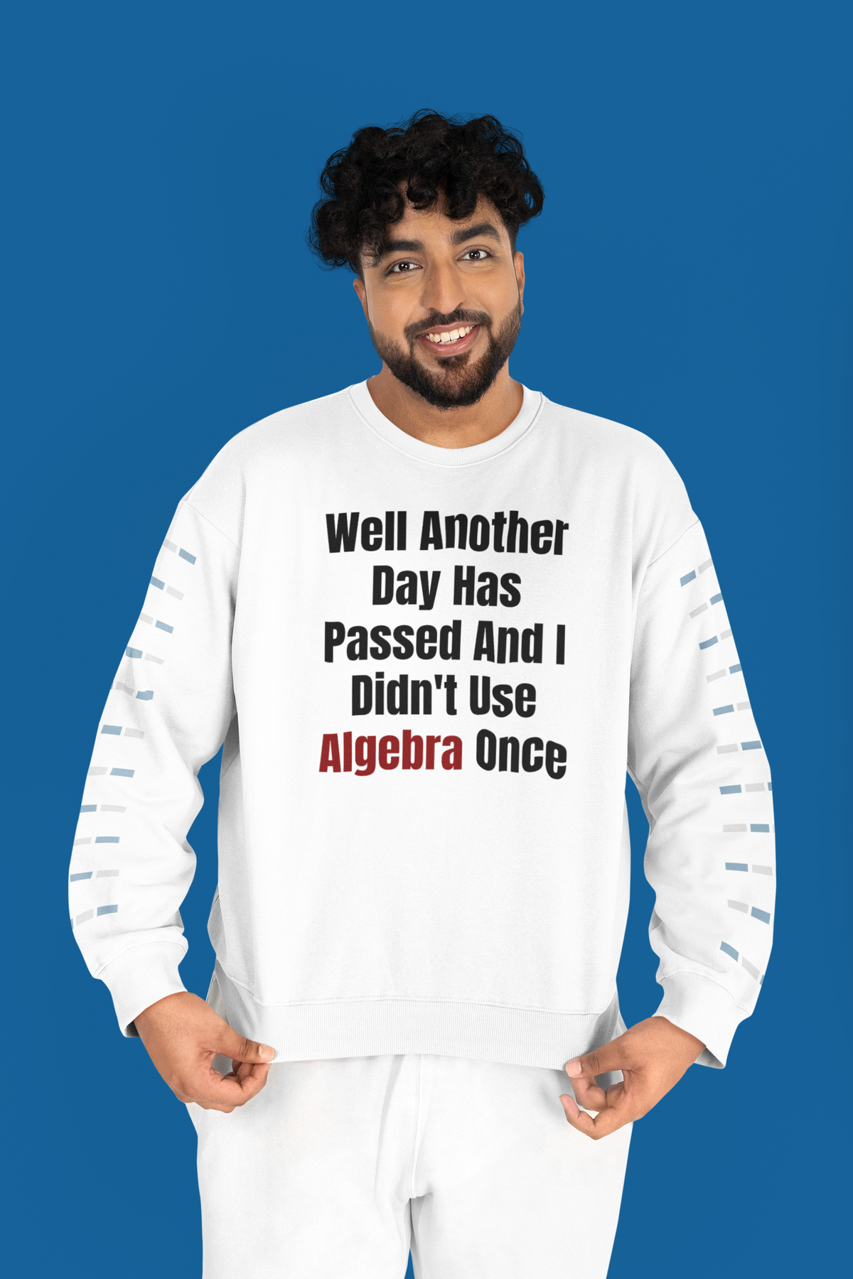 "Well Another Day Has Passed And I Didn't Use Algebra Once" sweatshirt in white, man on blue backdrop