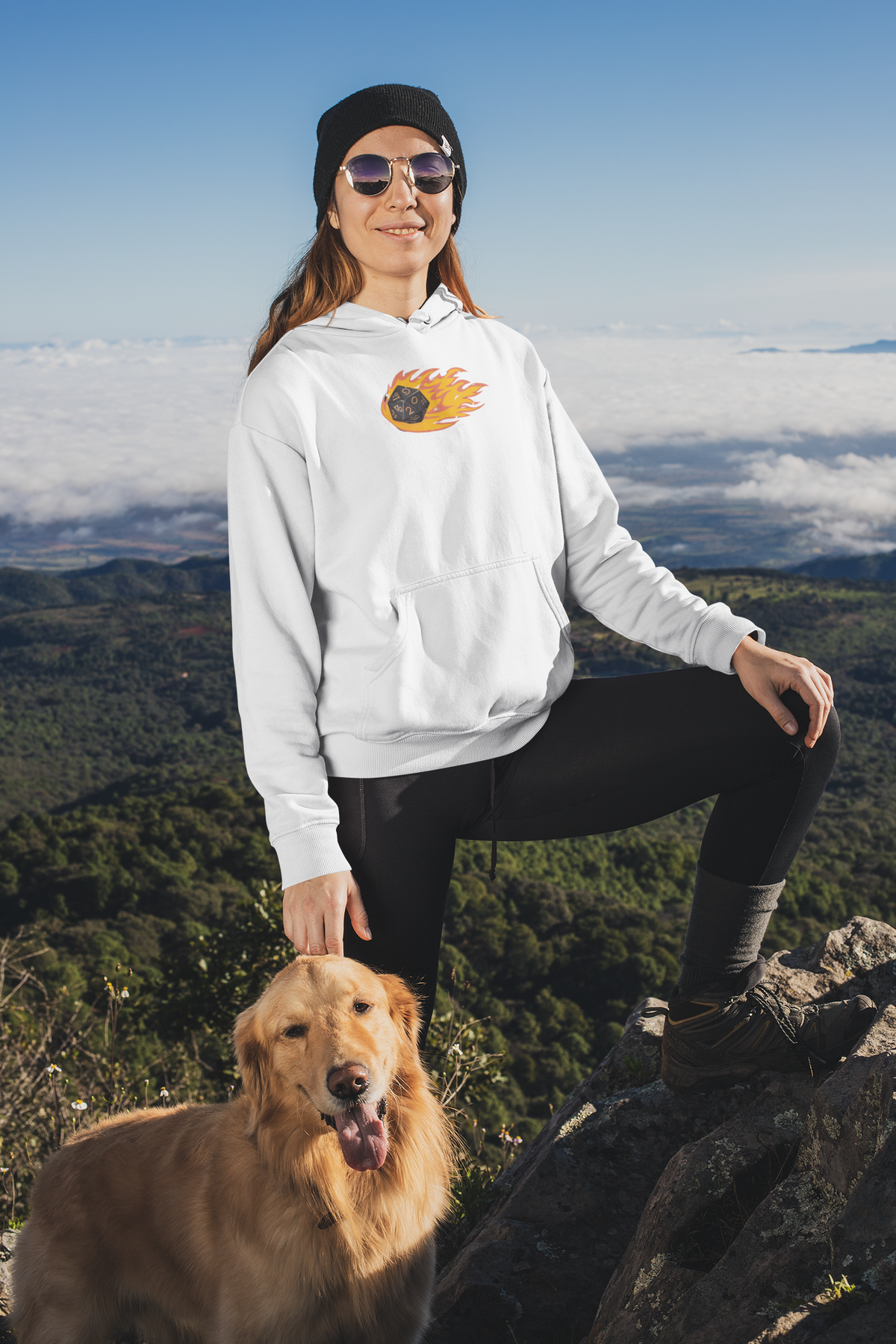 "Polyhedral Dice On Fire" hoodie in white, woman hiking with her dog, funny tabletop gamer gift