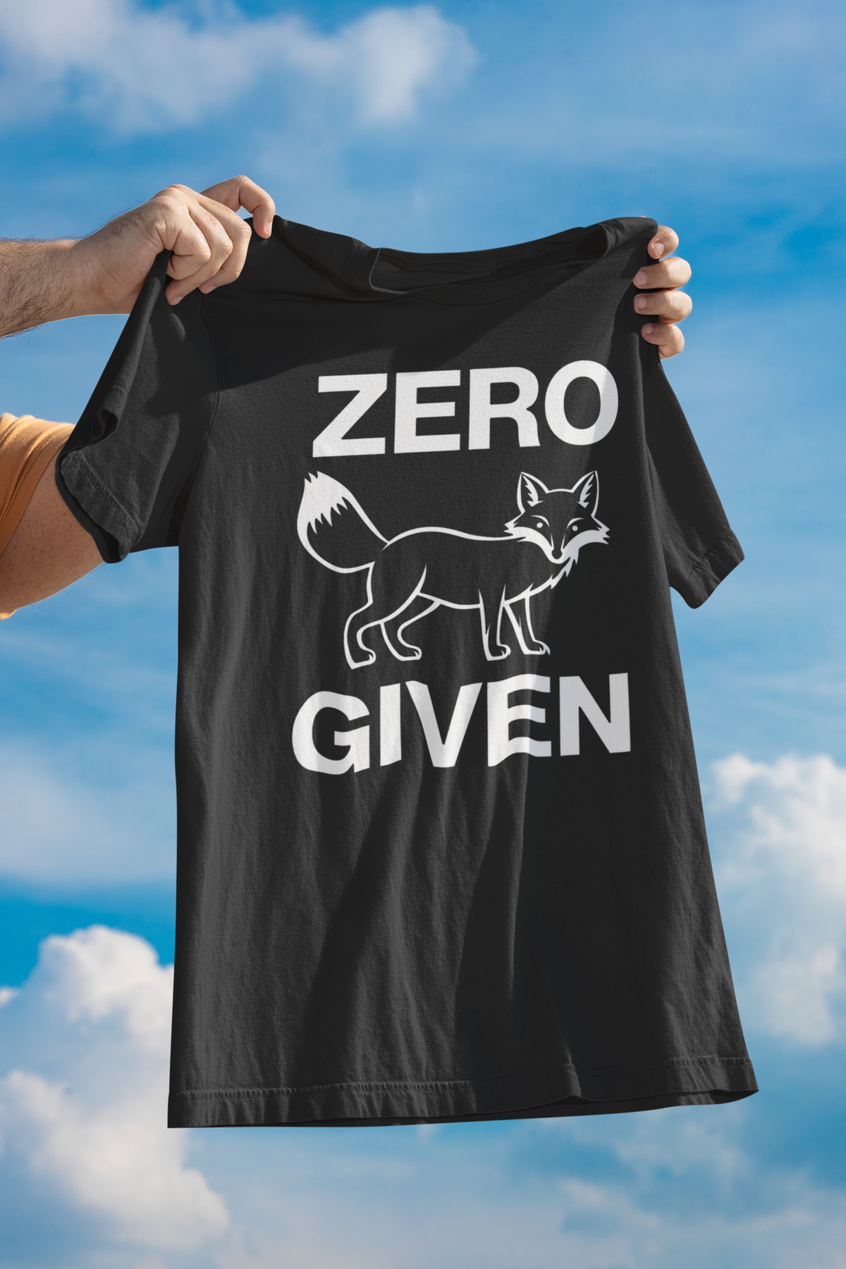 "Zero Fox Given" women's tee in black, held up against a blue sky, funny sarcastic gift shirt
