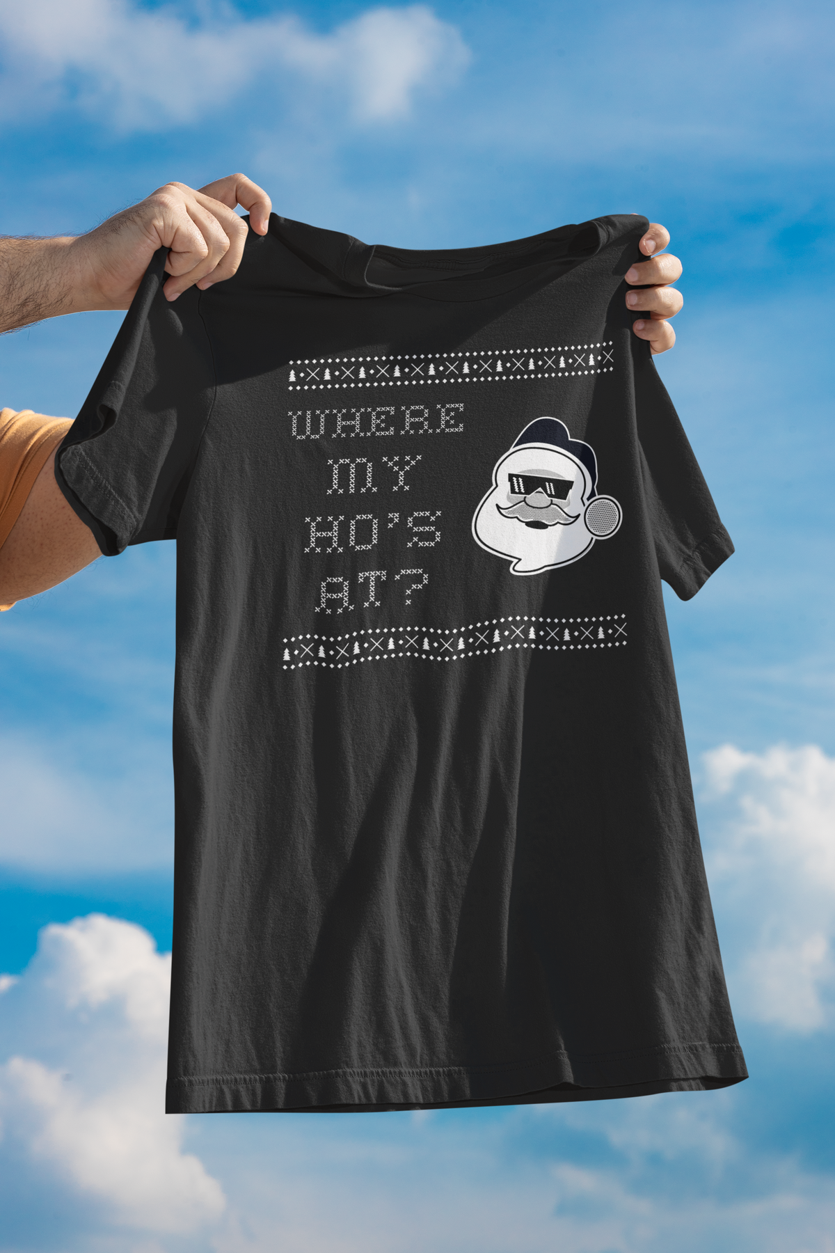 'Where My Ho's At' Santa graphic women's tee in black, held up against sky, funny ugly Christmas tee gift