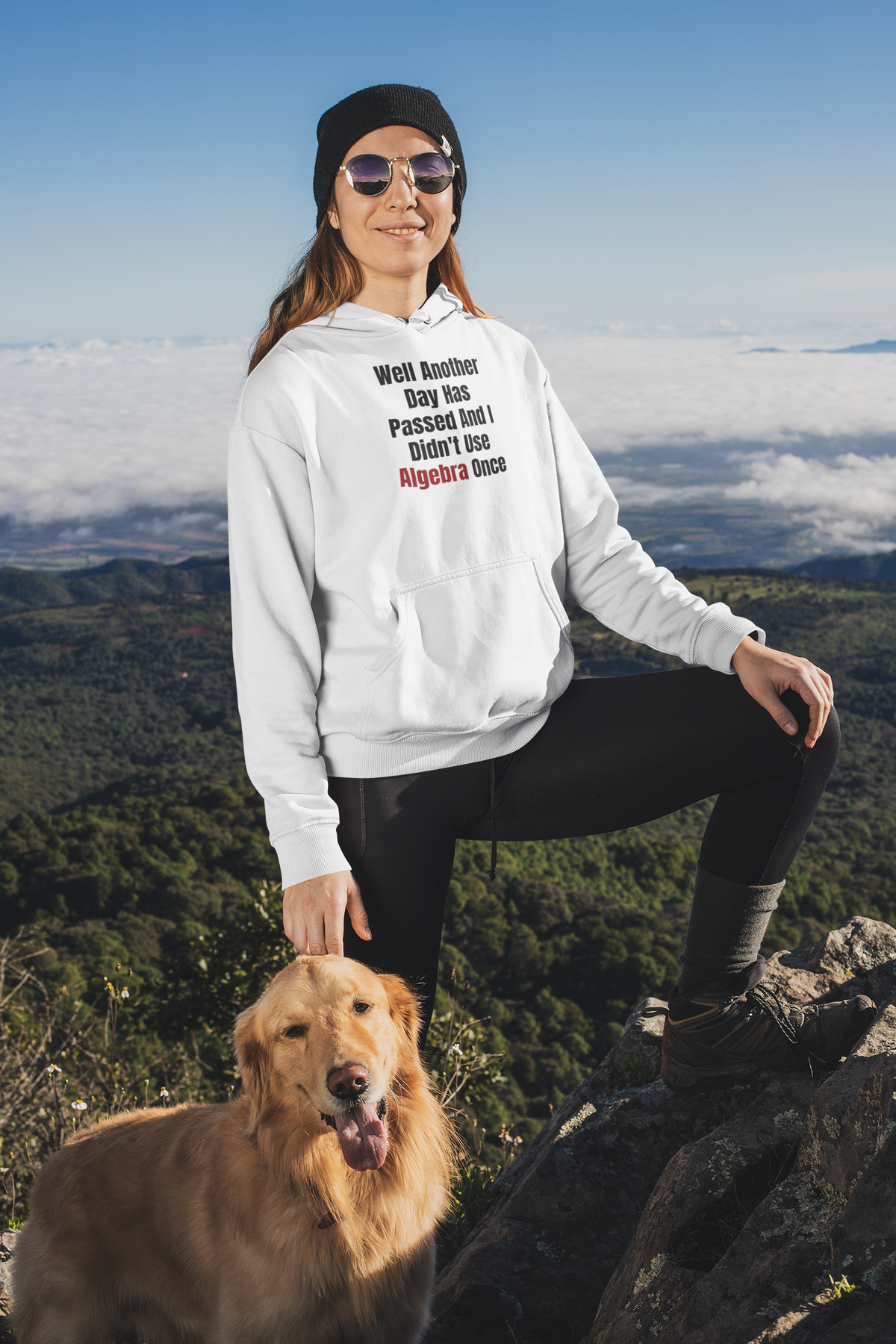 "Well Another Day Has Passed And I Didn't Use Algebra Once" hoodie in white, woman hiking with dog