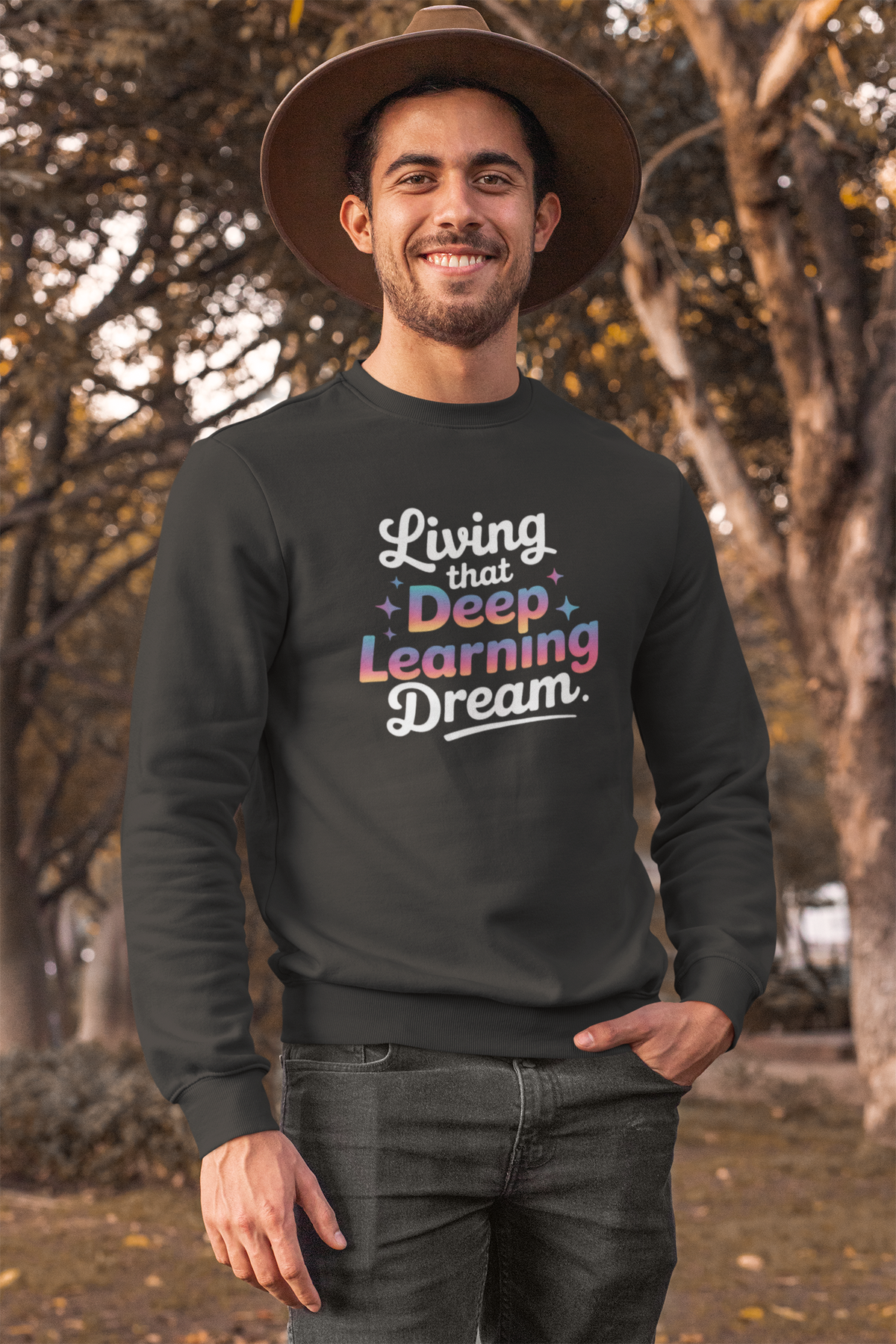 'Living that Deep Learning Dream' sweatshirt in black, man standing outdoors in a hat, coder gift