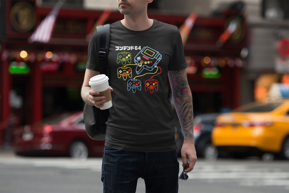 Retro game console t-shirt in black, man walking with coffee in a city street, funny gamer gift