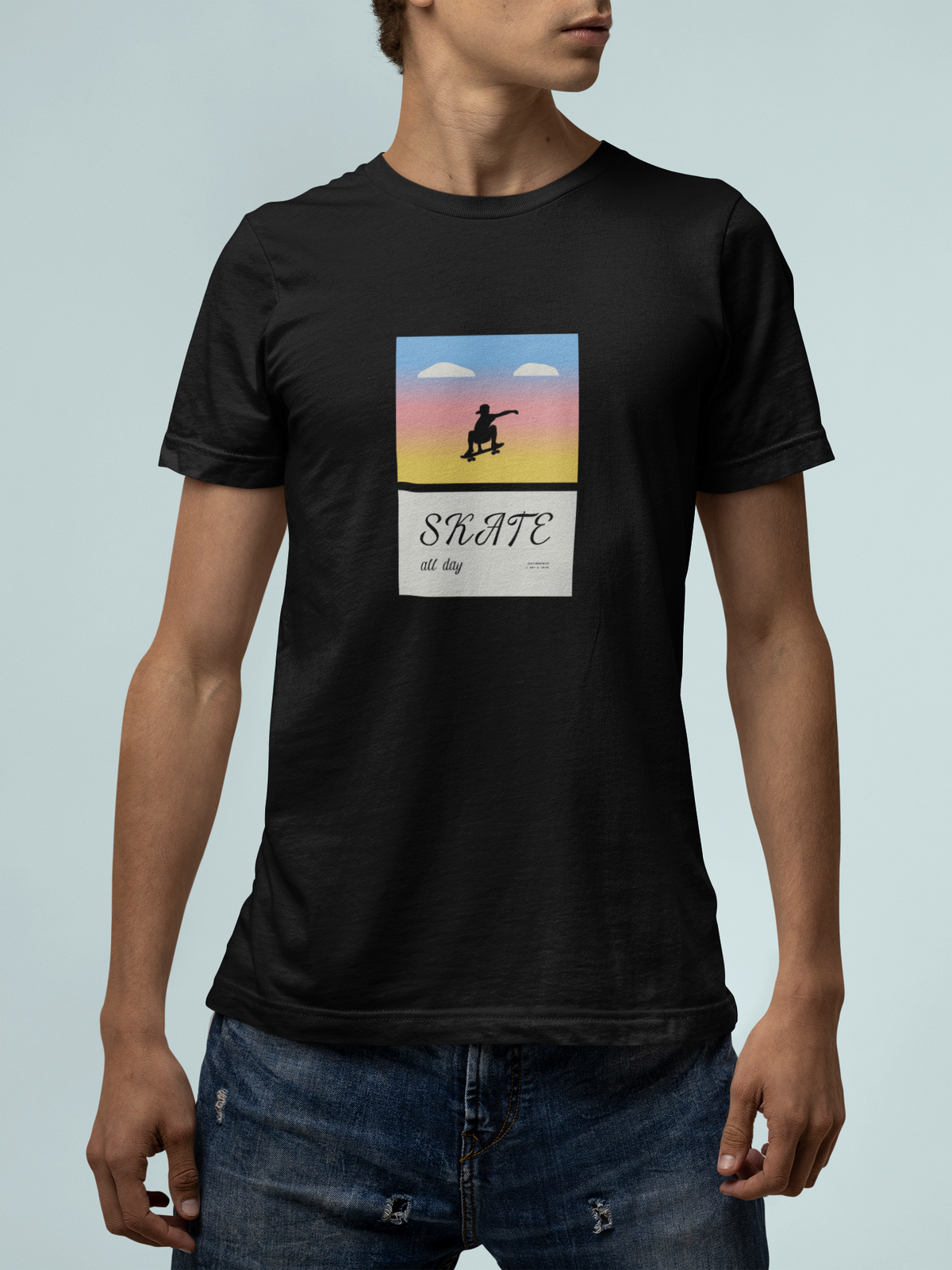 'Skate All Day' t-shirt in black, man wearing it with jeans, T-Shirt mockup, Geekpsters