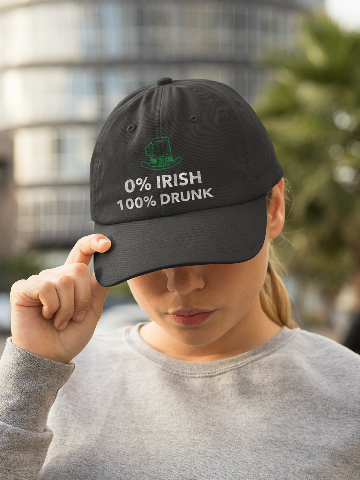 '0% Irish 100% Drunk' dad hat in black, woman wearing it outdoors, funny embroidered cap gift for her