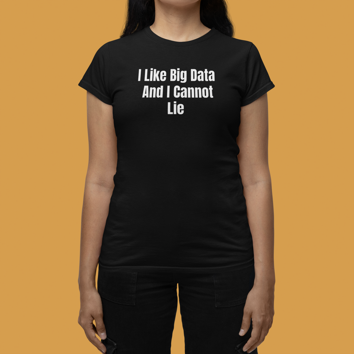 'I Like Big Data And I Cannot Lie' Women's Tee in black, woman wearing it against mustard backdrop, data gift