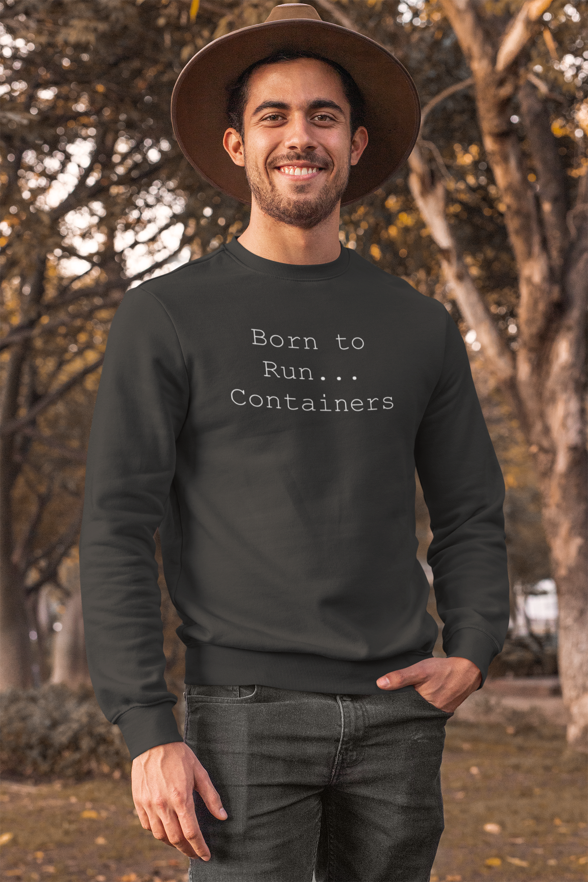 'Born to Run... Containers' sweatshirt in charcoal, man wearing it outdoors in a hat, funny DevOps gift