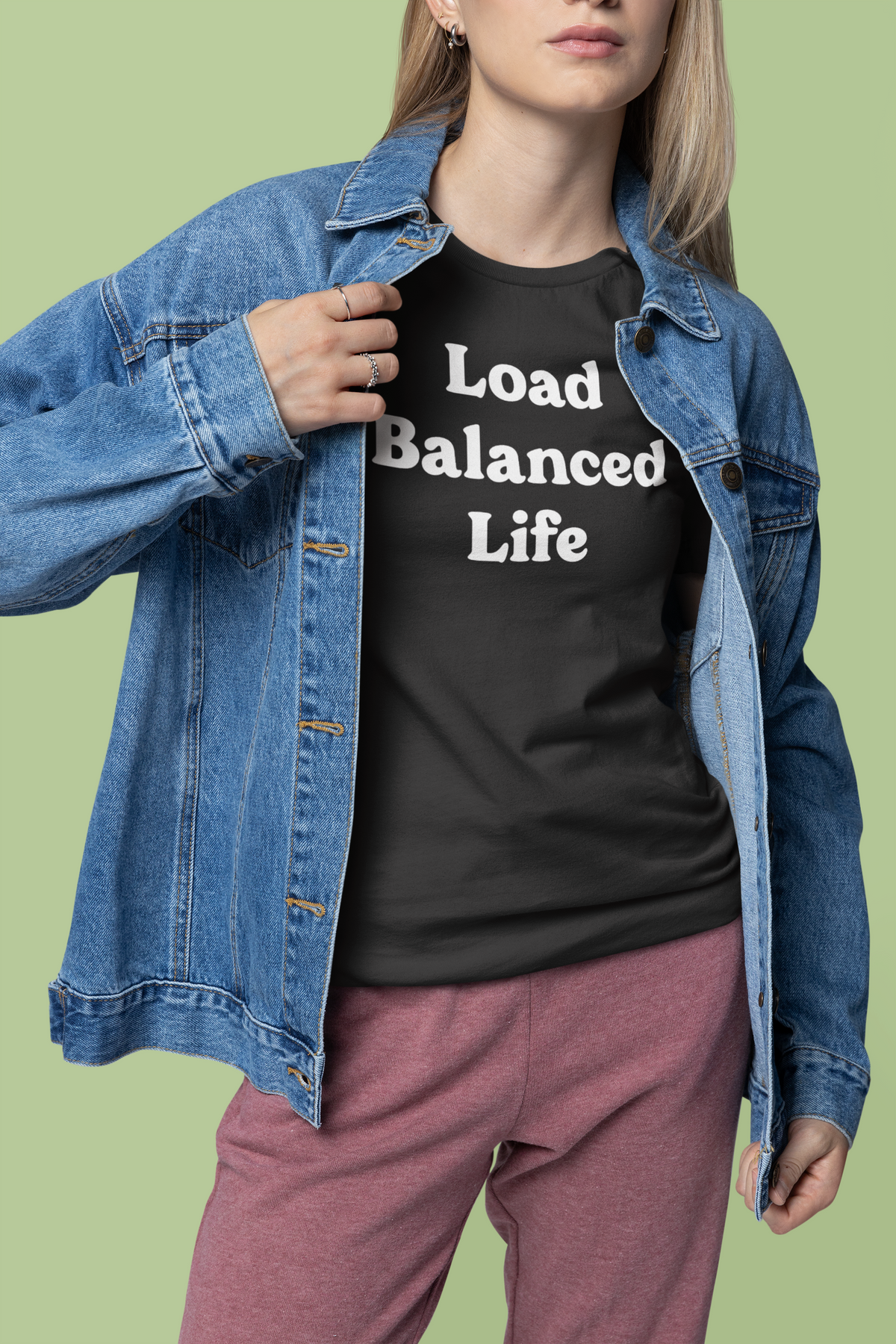 Load Balanced Life black t-shirt worn by a woman in an open denim jacket, funny gift for IT professionals