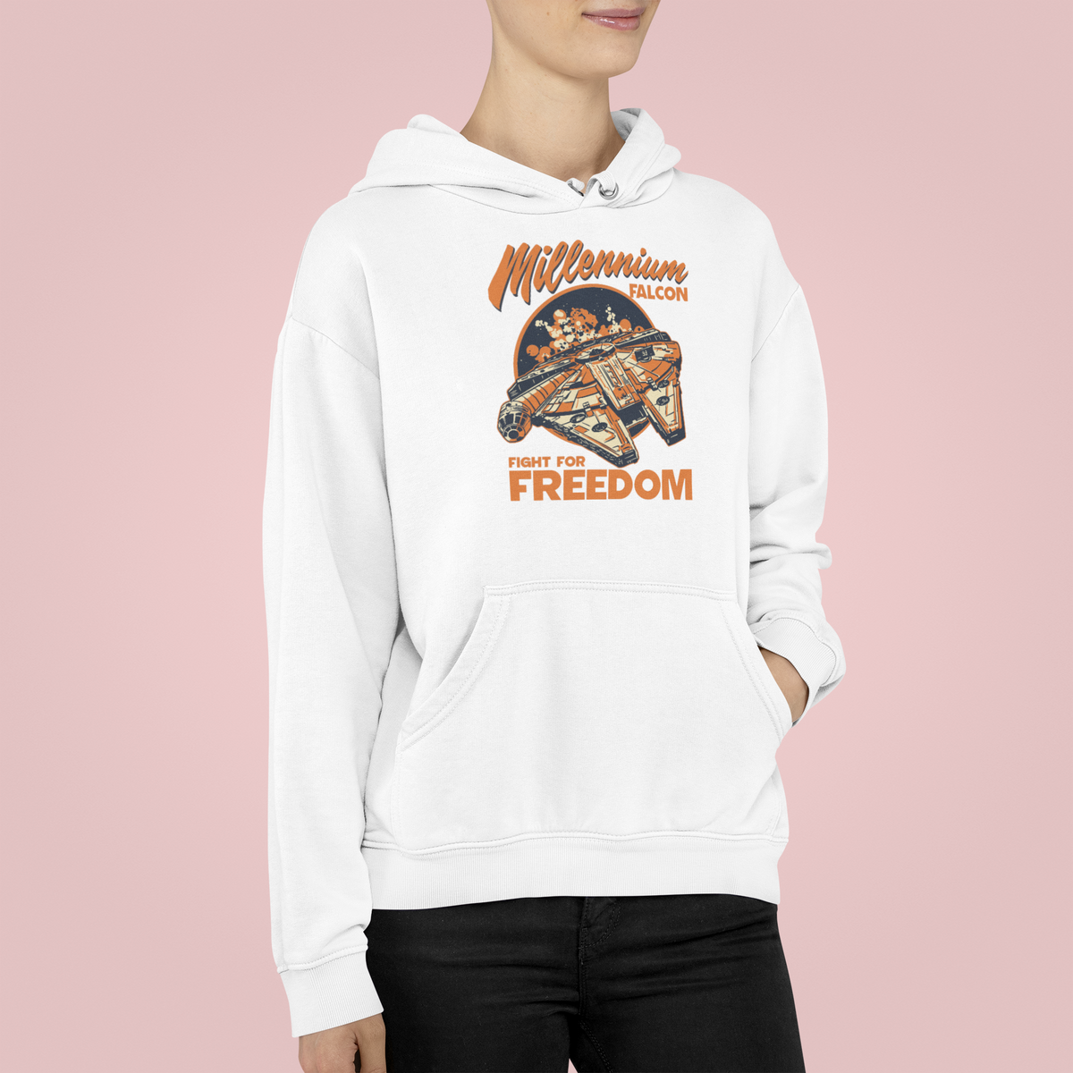 'Millennium Falcon Fight for Freedom' hoodie in white, woman wearing it on pink background, fun geek girl gift
