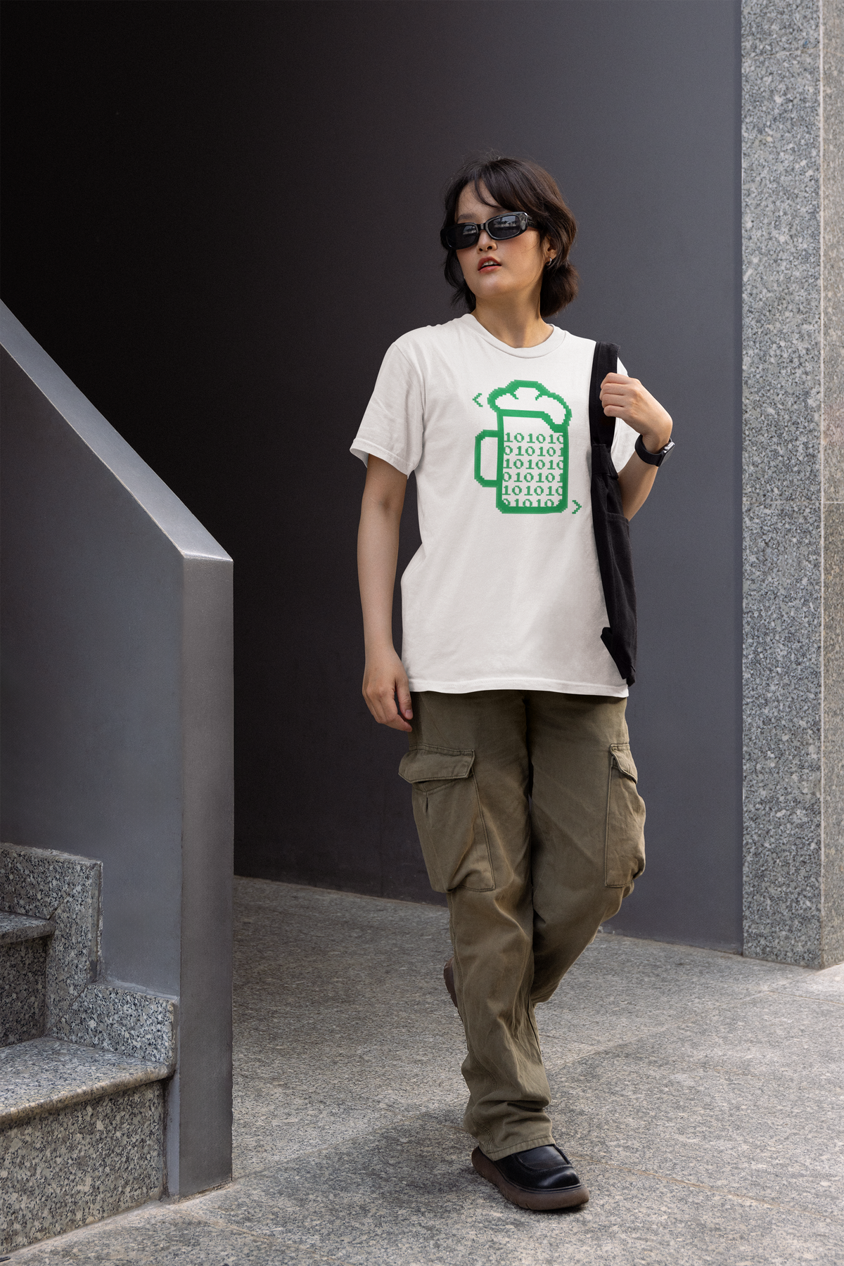 Beer Code binary mug tee in white, woman walking wearing it in cargo pants, funny geek gift
