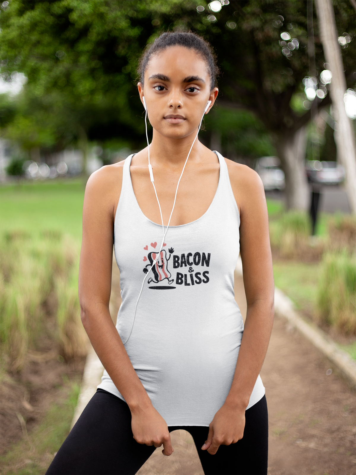 'Bacon & Bliss Women's Tank' in white, woman in a park, Tank Top mockup, Geekpsters