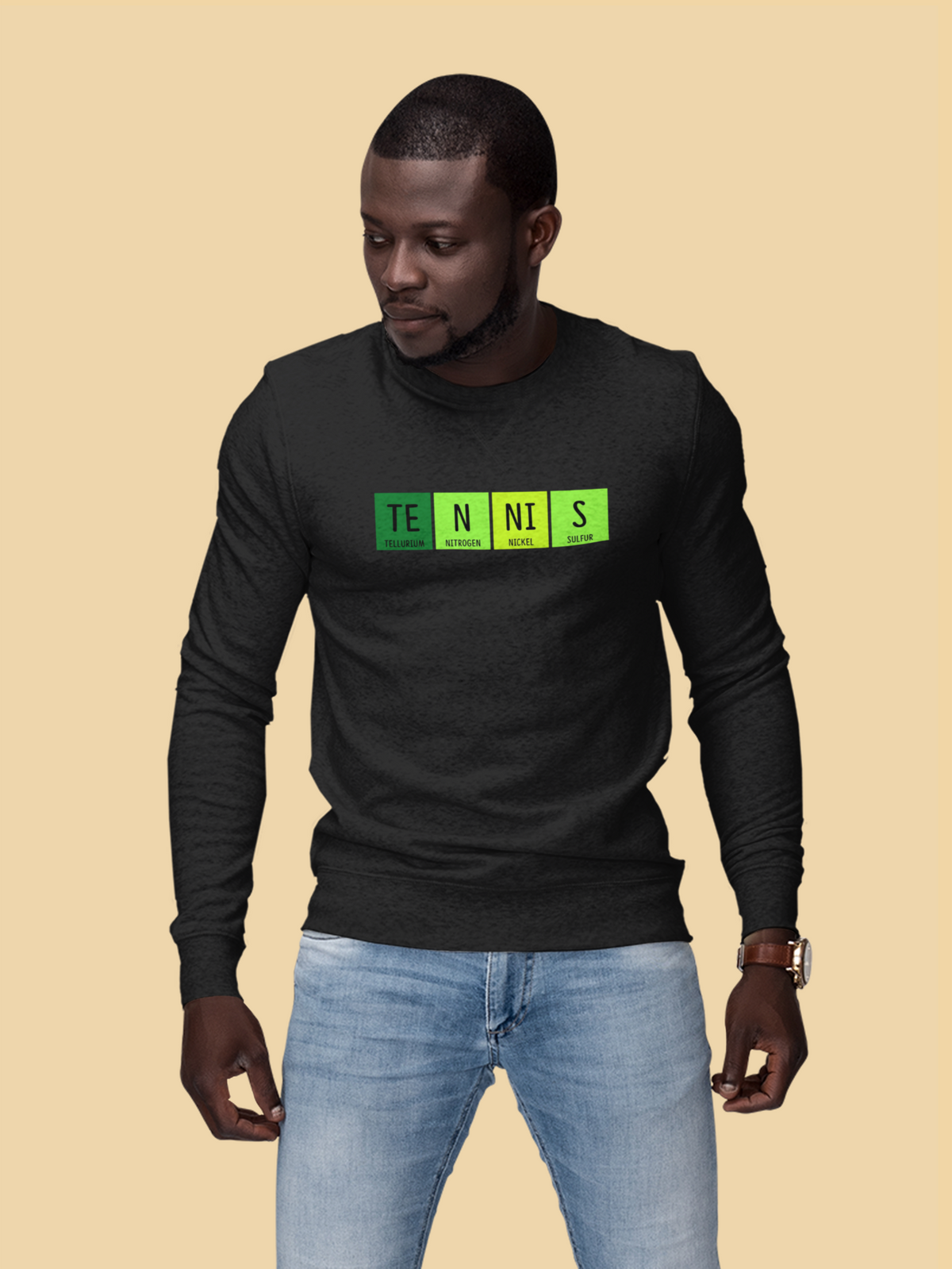 'Tennis' periodic table sweatshirt in black, man wearing it in studio, funny chemistry pun tennis gift