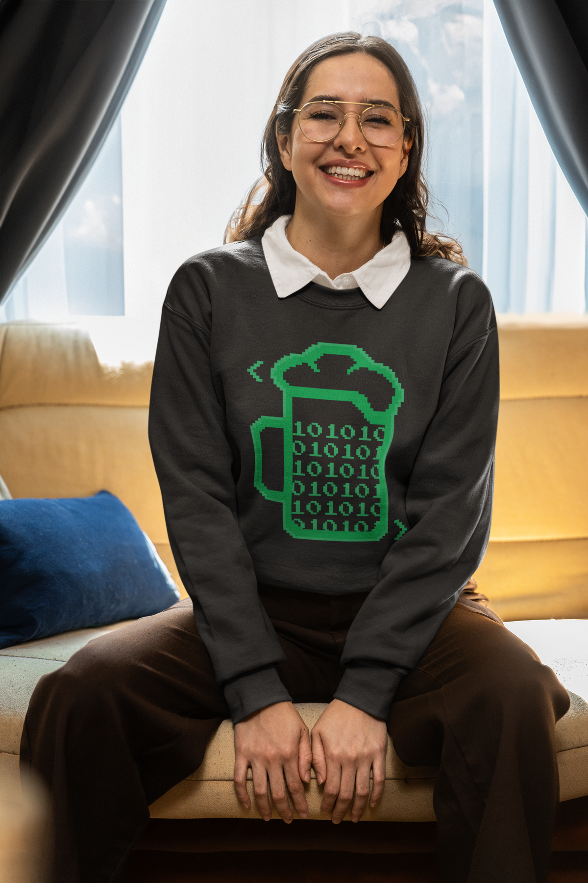 Beer Code binary mug sweatshirt in dark grey, woman wearing it seated in glasses, funny developer gift