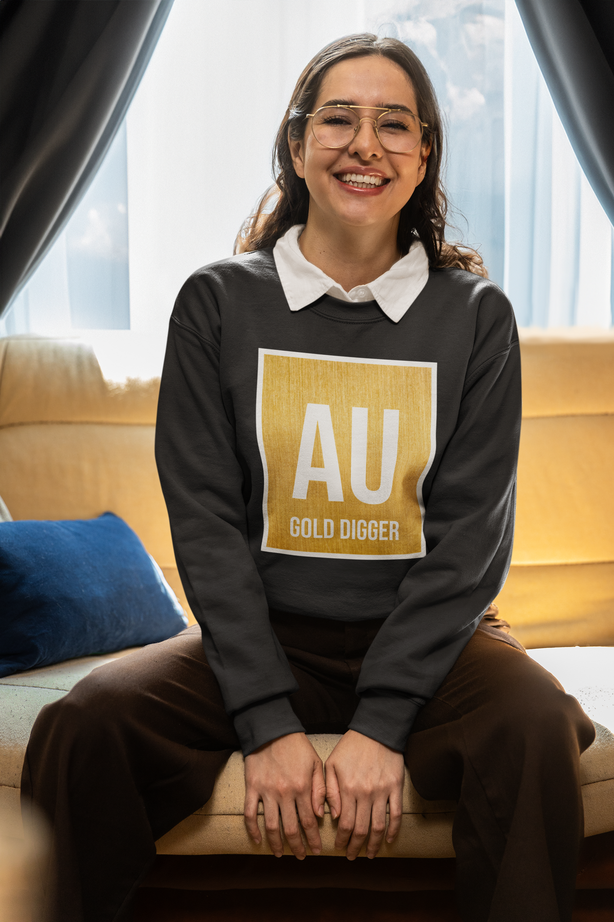 AU Gold Digger crewneck sweatshirt in black, woman sitting indoors wearing it, funny science gift