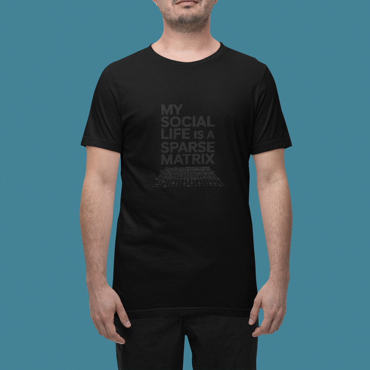 'My Social Life Is a Sparse Matrix' t-shirt in black, man wearing it in a studio, T-Shirt mockup, Geekpsters
