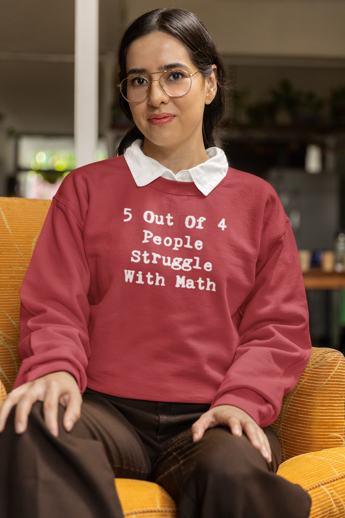 'Math Struggle For 5 Out Of 4 People Sweatshirt' in heather sport scarlet red, woman in a vintage outfit, Sweatshirt mockup