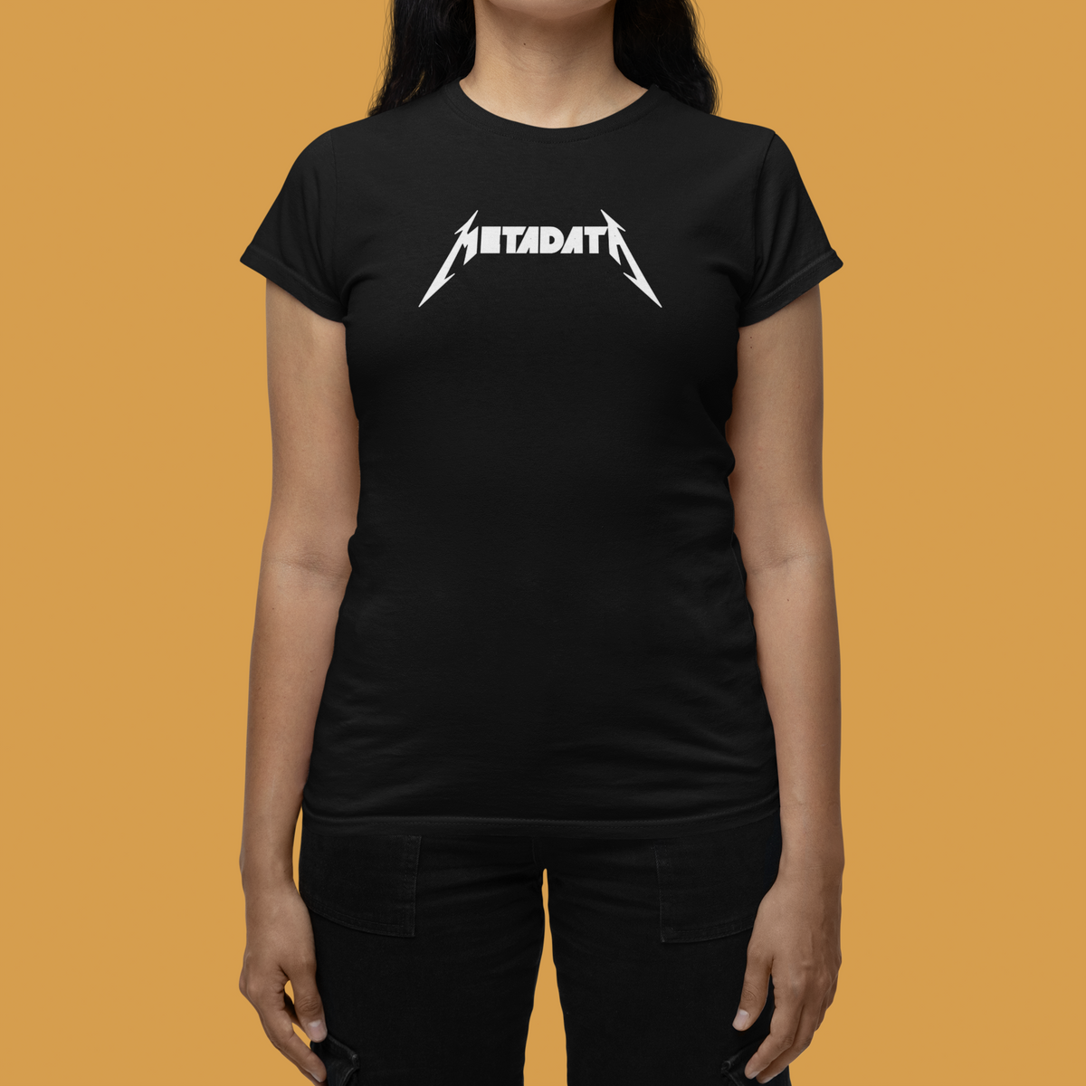 'Metadata' women's tee in black, woman wearing it on mustard background, funny data science tee gift