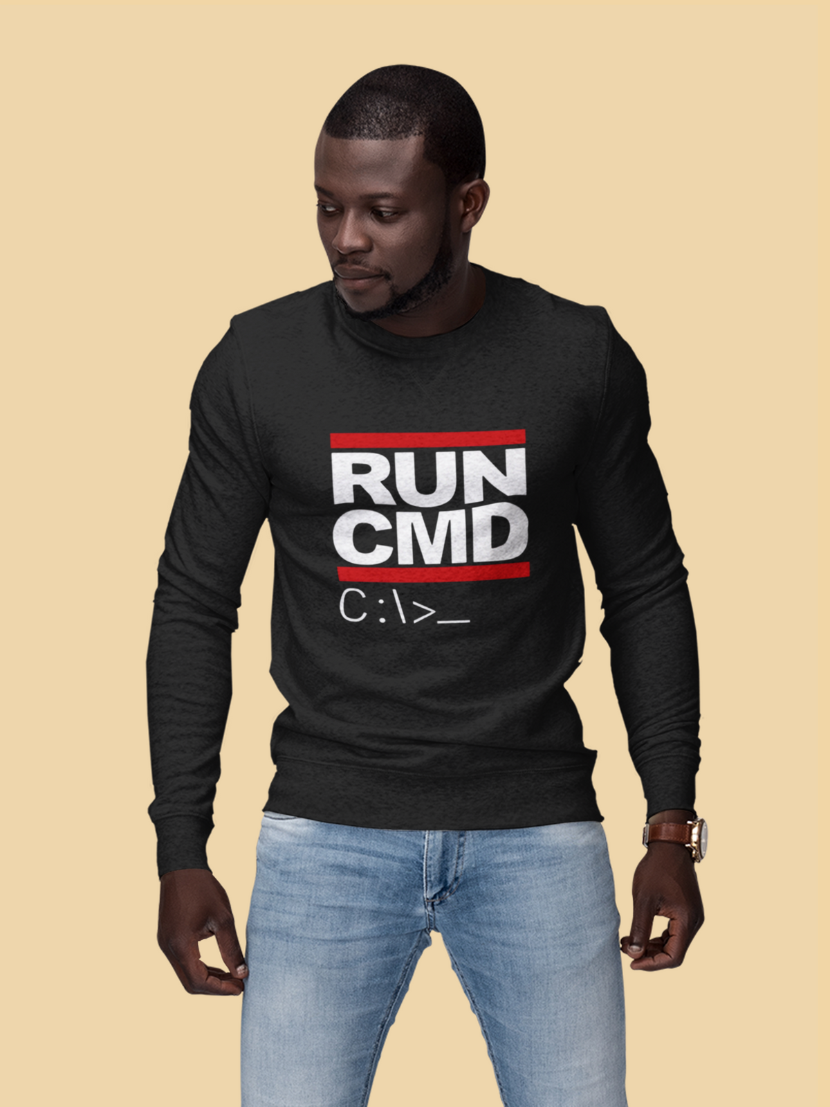 RUN CMD sweatshirt in black, man wearing it on a mustard background, funny coder pun gift