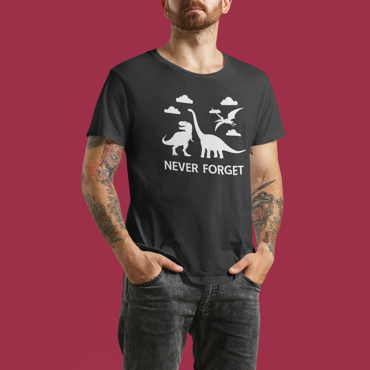 'Never Forget' dinosaur t-shirt in black, man wearing it on maroon background, funny science gift
