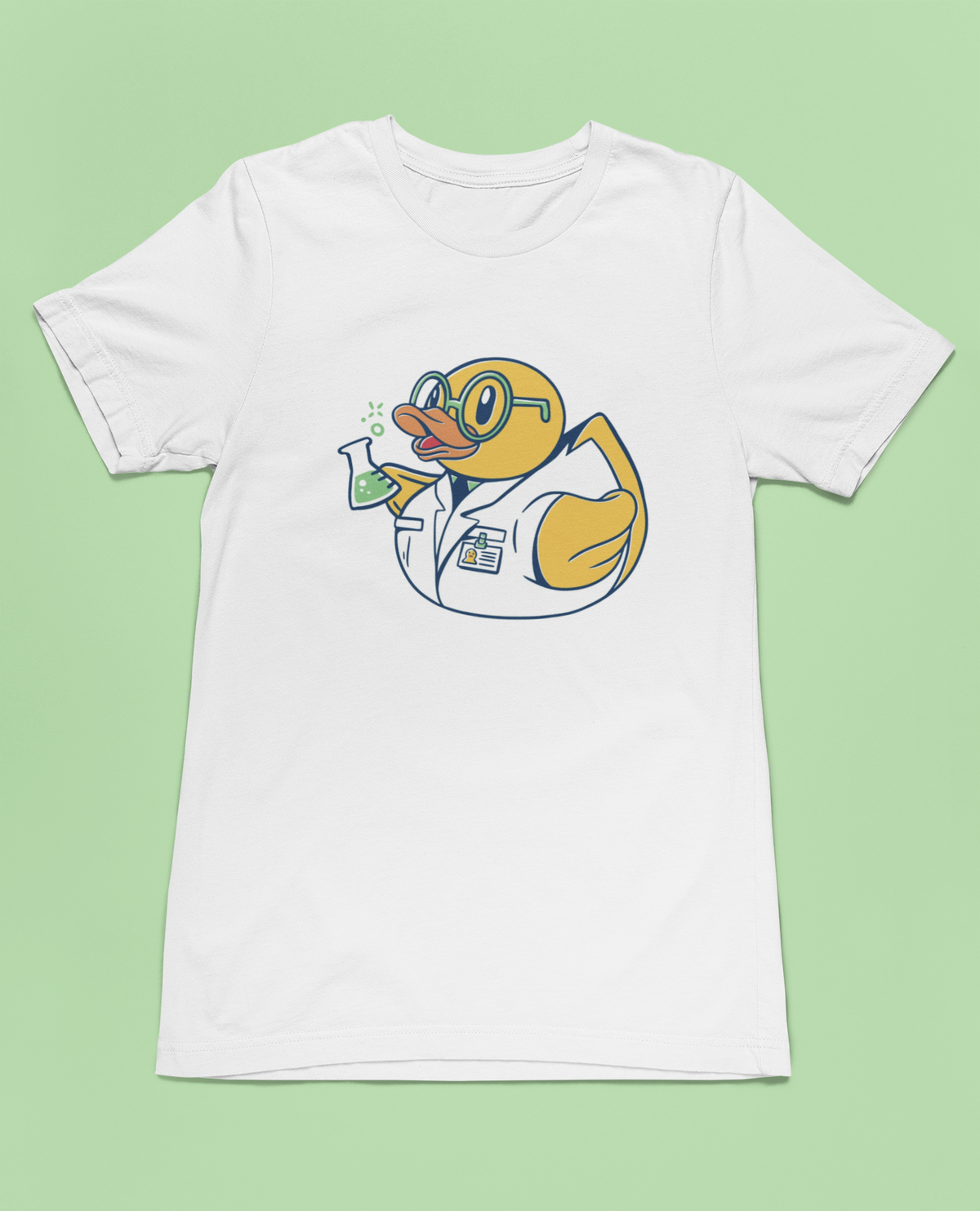 Science duck t-shirt in white, flat lay on a light green background, funny gift for scientists