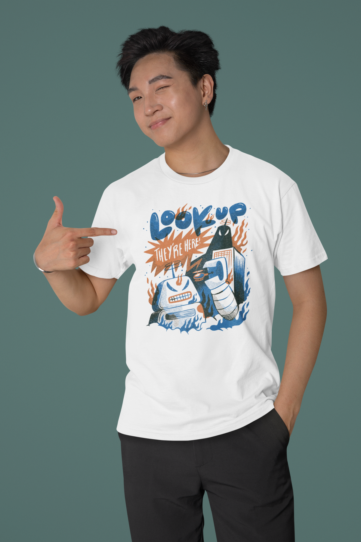 Look Up The Robots Are Here t-shirt in white, man model wearing it against a green background